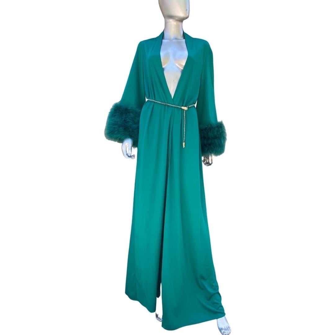 So chic and so hard to come by. This beauty was lovingly kept and rarely used (if at all) by a Palm Springs Fashionista with the most amazing vintage treasures we have ever seen. It can be used as a dress , with closure at waist, a coat with