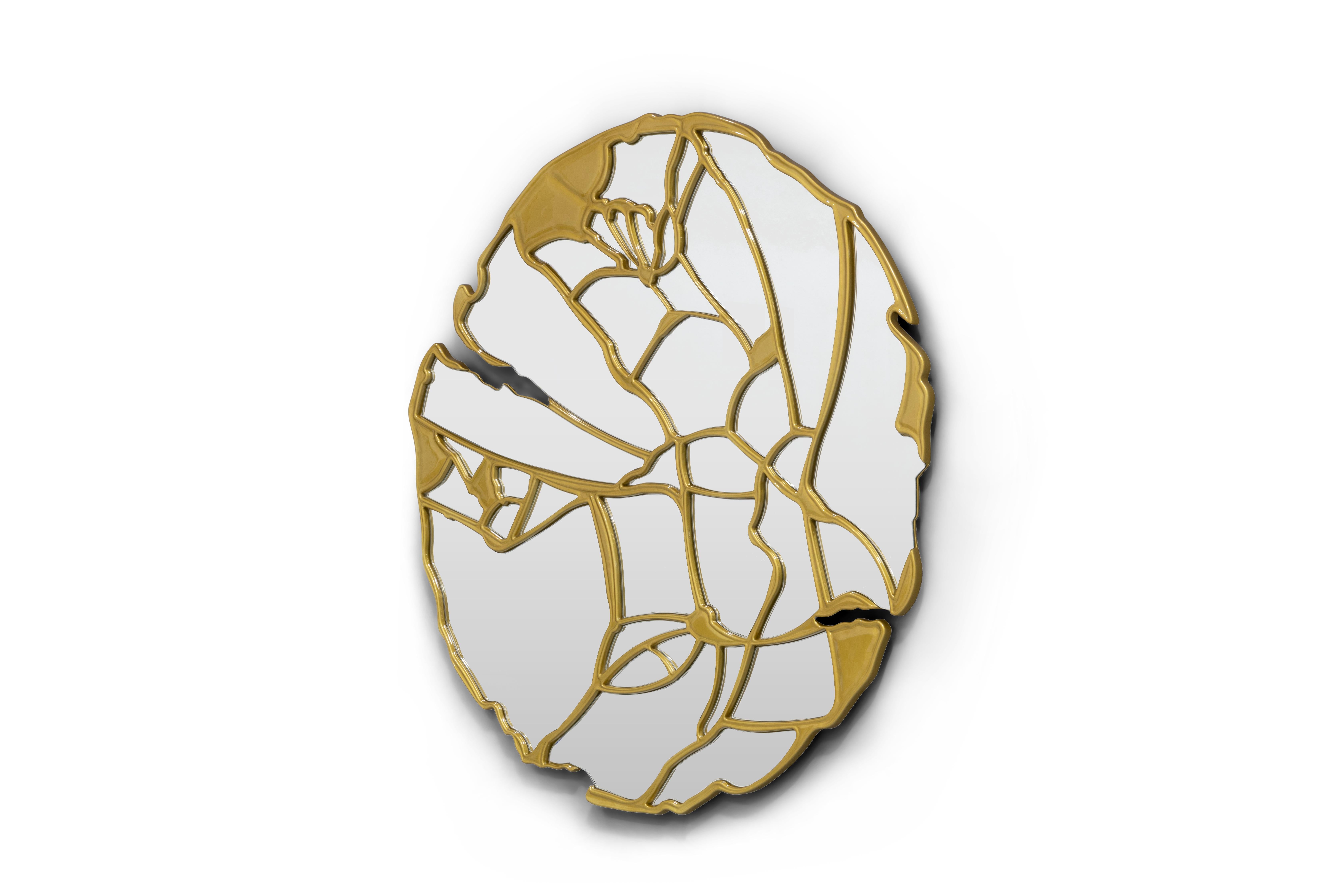 The Glance Mirror is an outstanding round wall mirror designed for contemporary interiors and majestic rooms. Crafted with meticulous attention to detail, Glance features a captivating touch of elegance. The mirror is composed of expertly fragmented