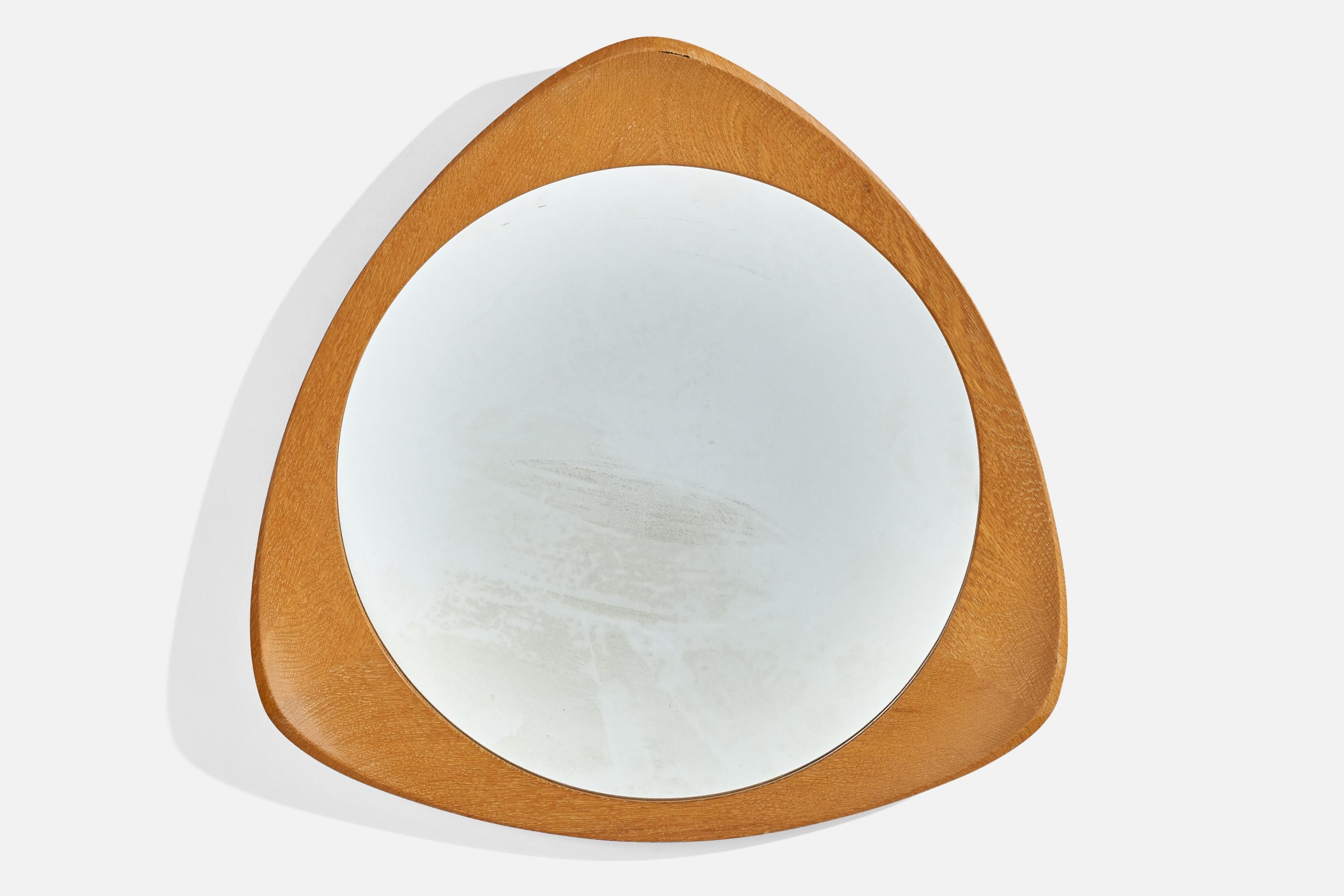 An oak and crystal glass wall mirror designed and produced by Glas & Trä, Hovmantorp, Sweden, 1960s.