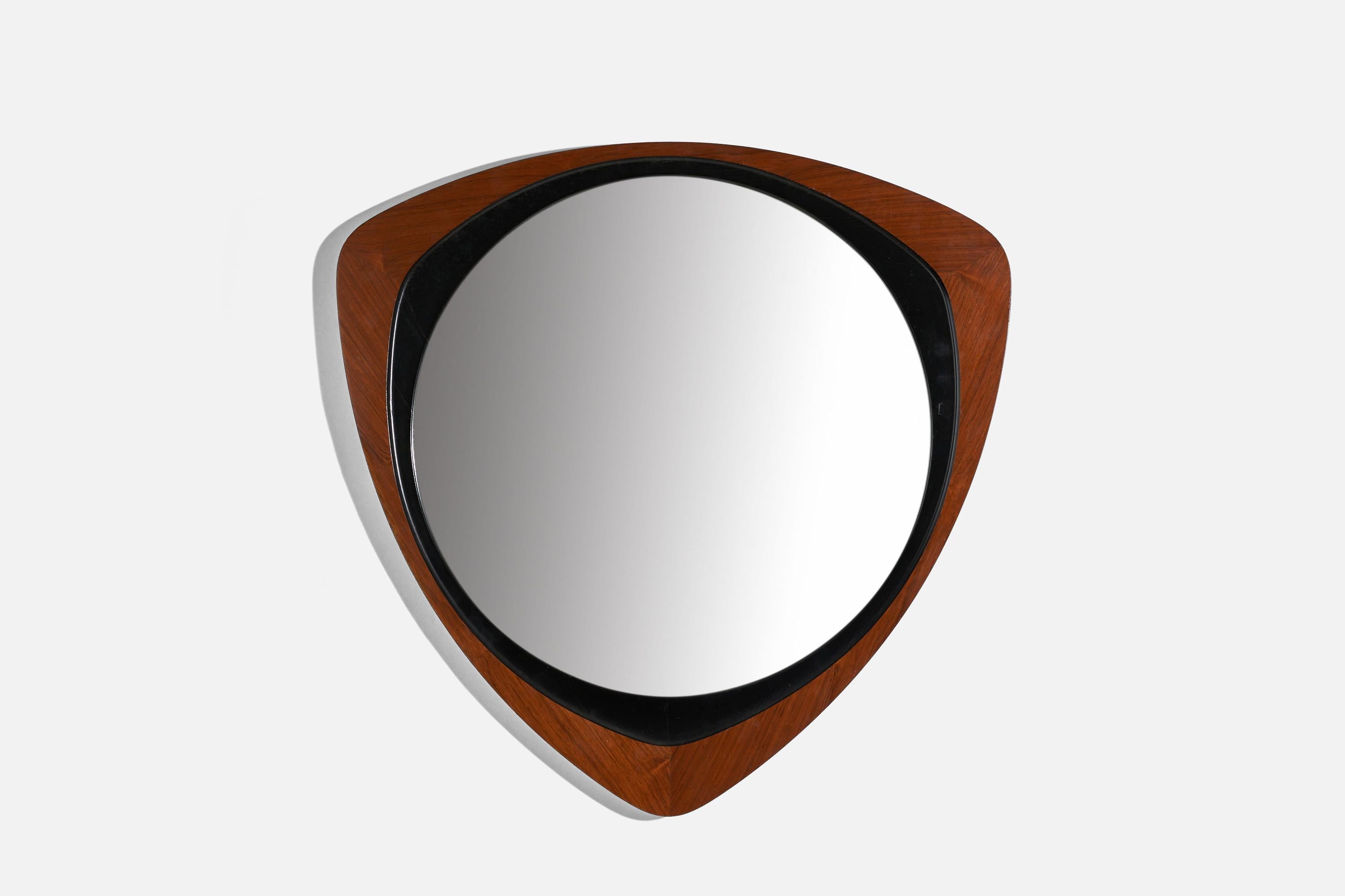 A rosewood and black-painted wood wall mirror designed and produced by Glas & Trä, Sweden, 1950s.