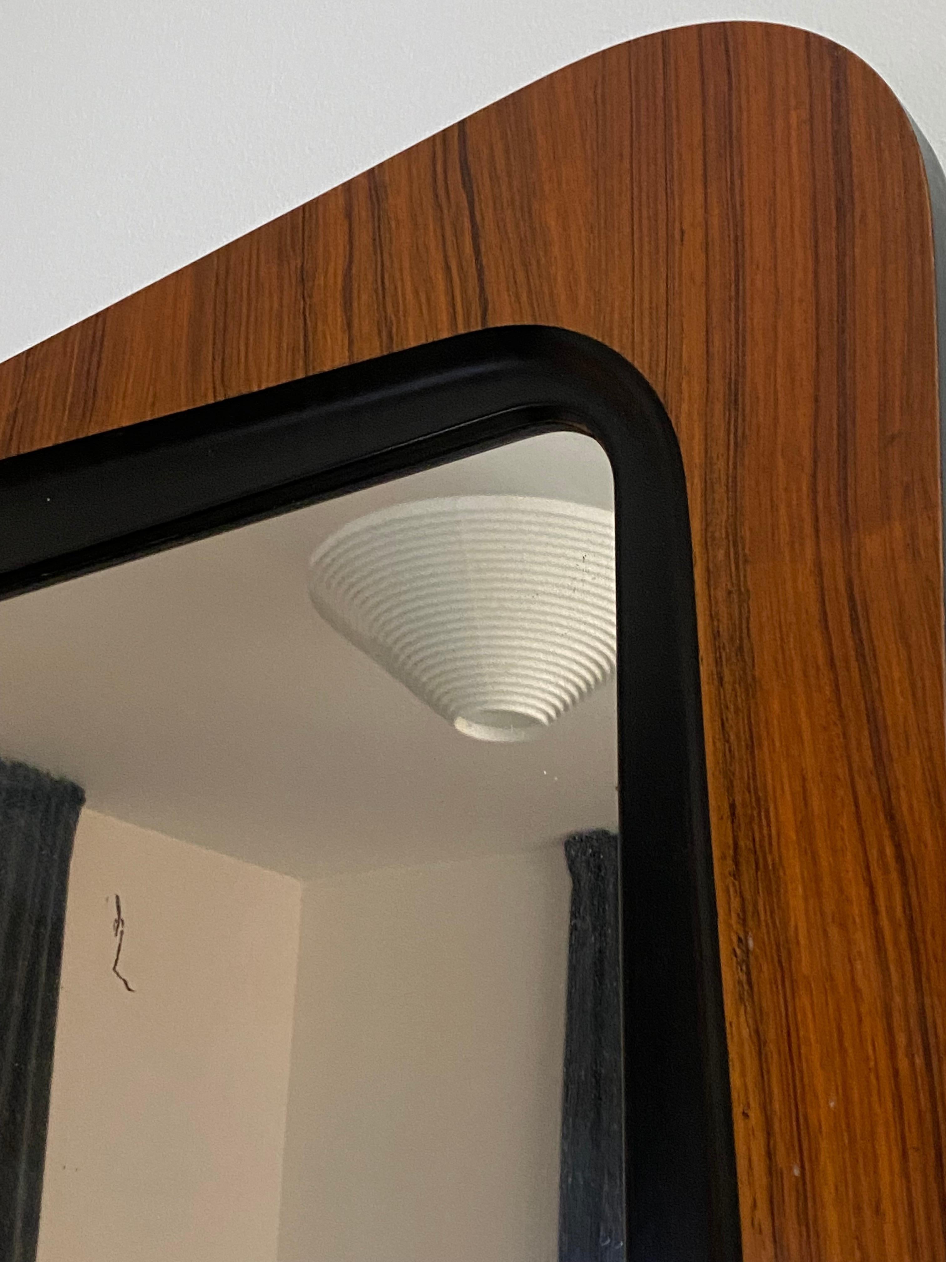 A rare wall mirror by Glas & Trä, Hovmantorp, Sweden. Produced in the 1950s, marked with maker’s label.

Other designers of the period include Hans Agne Jacobsen, Josef Frank, Finn Juhl and Arne Jacobsen.