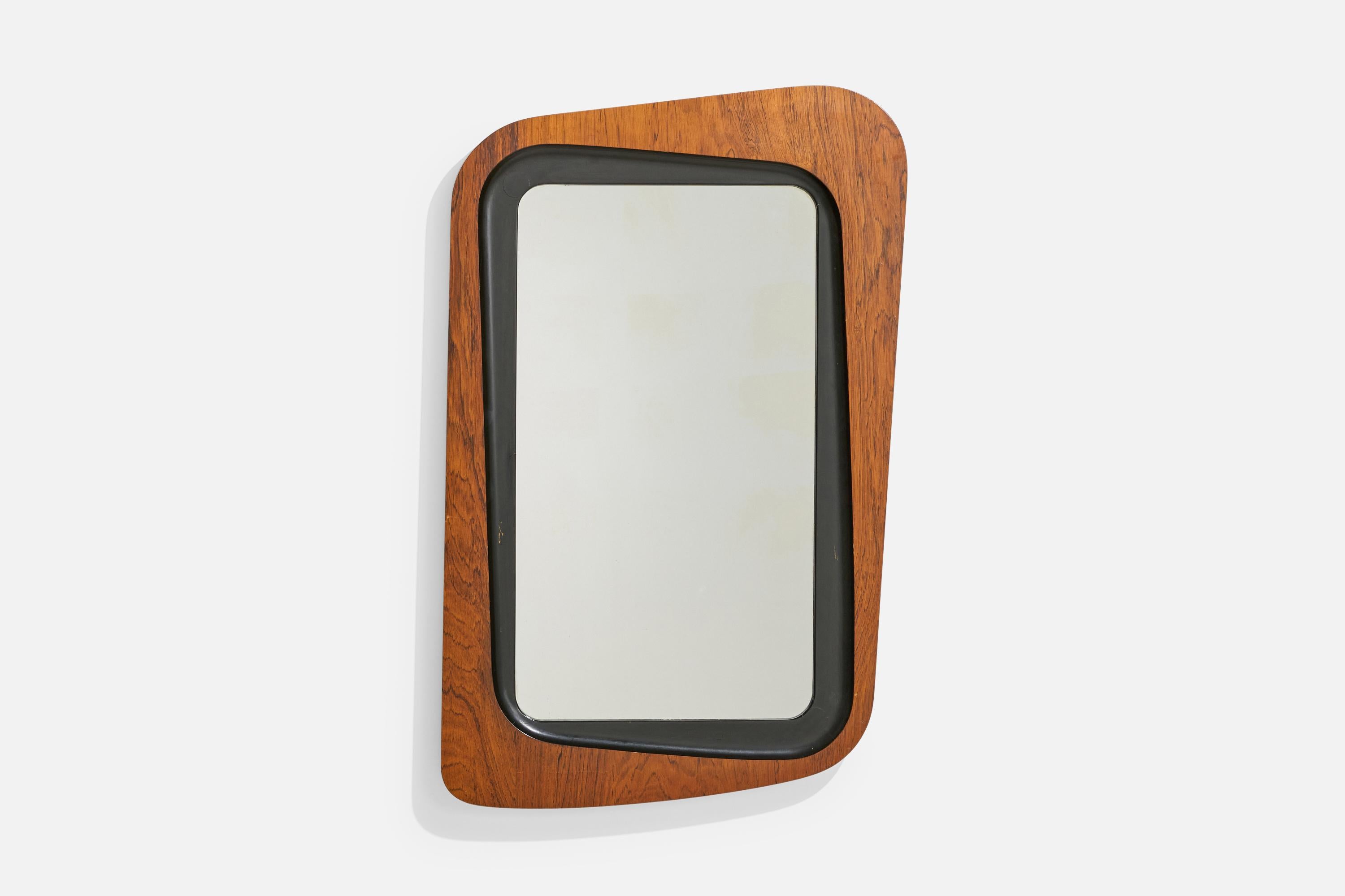 A rosewood, black-painted wood and crystal glass wall mirror designed and produced by Glas & Trä, Hovmantorp, Sweden, 1950s.