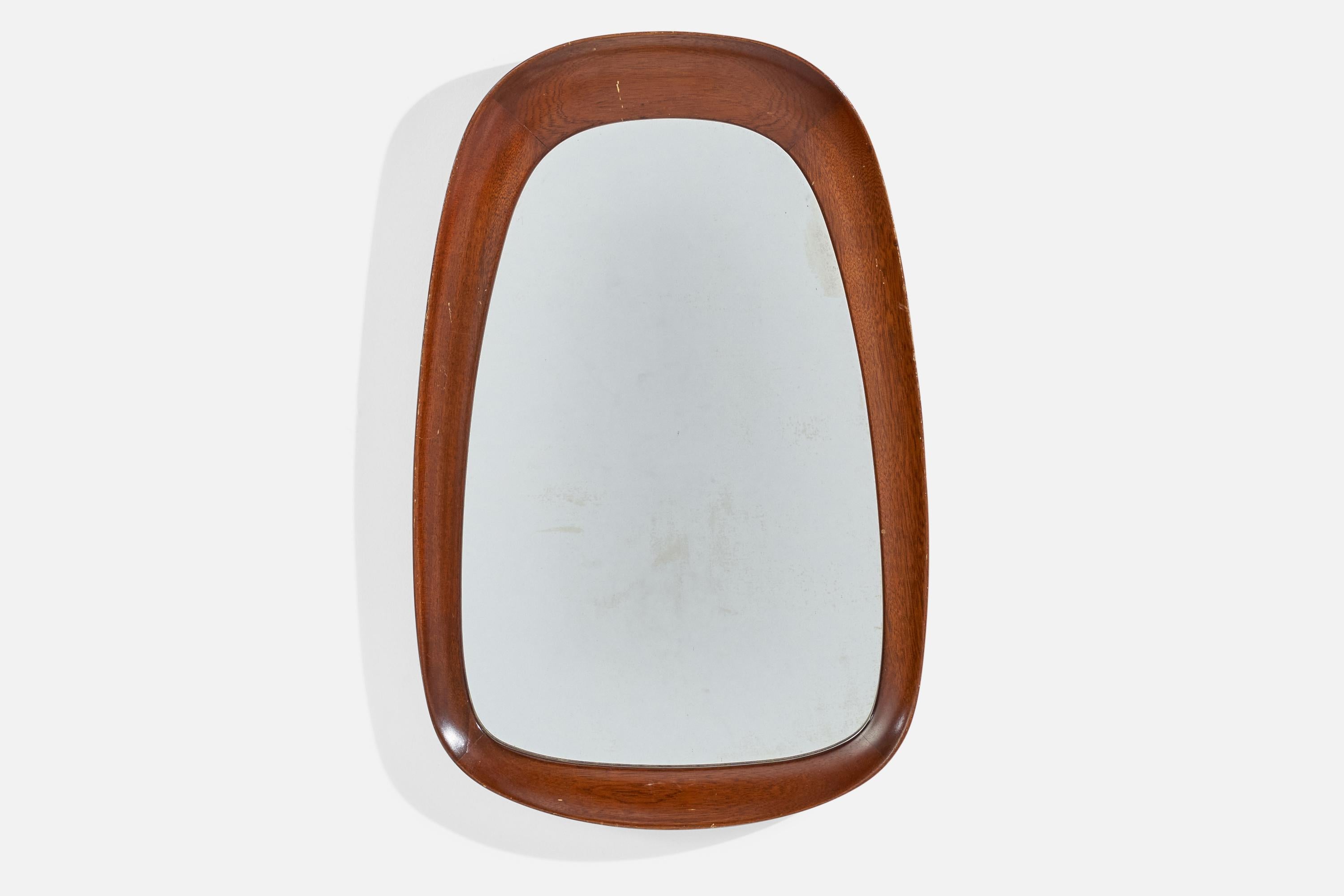 A teak and crystal glass wall mirror designed and produced by Glas & Trä, Hovmantorp, Sweden, 1950s.
