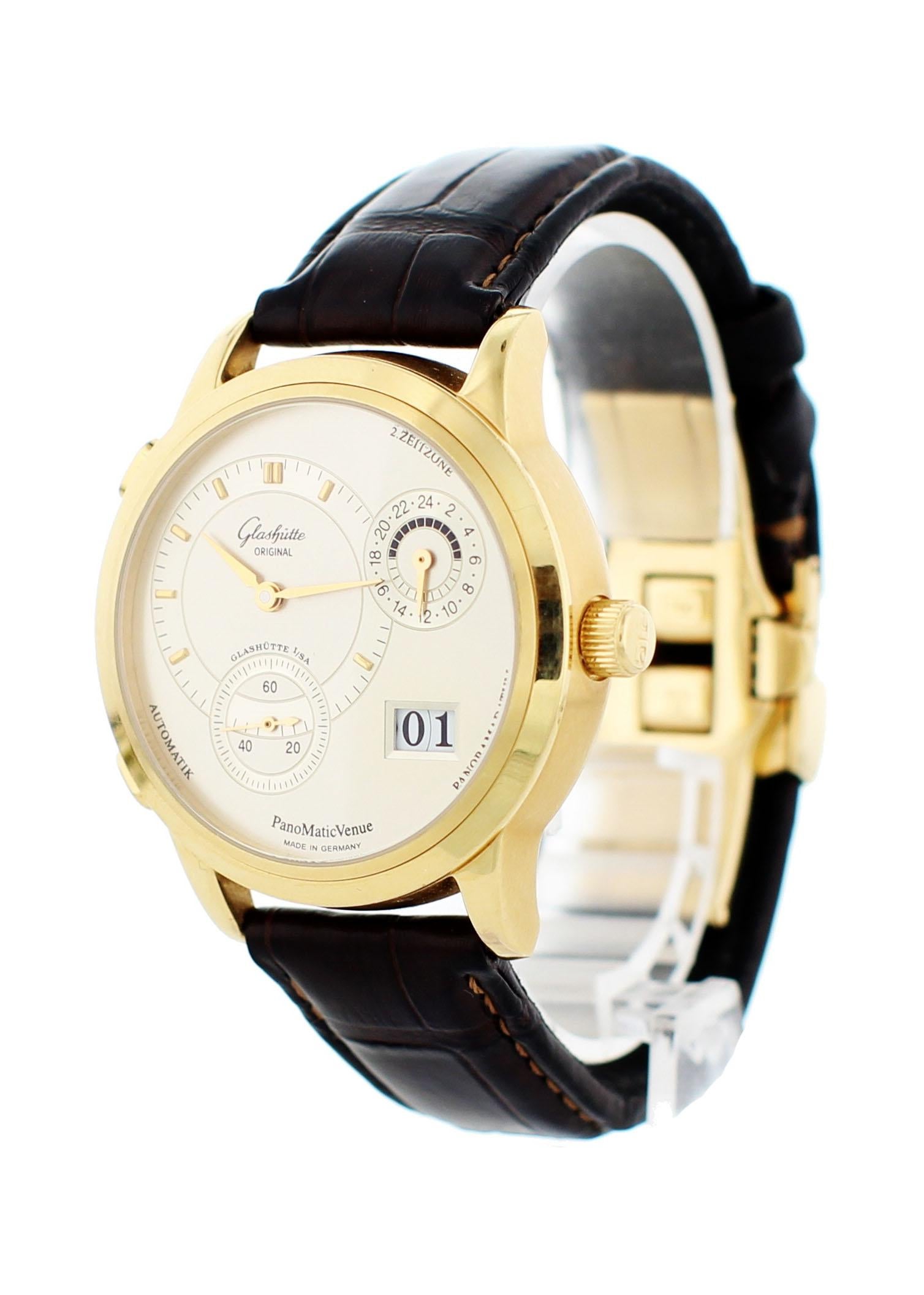 Glashutte Original Panomatic Venue 90-04-01-001-04. 39mm 18k Yellow Gold case with a smooth stationary bezel. Silver dial with steel hands and a small seconds subdial at the 7 o'clock position. Date display and a 24-hour indicator between the 2