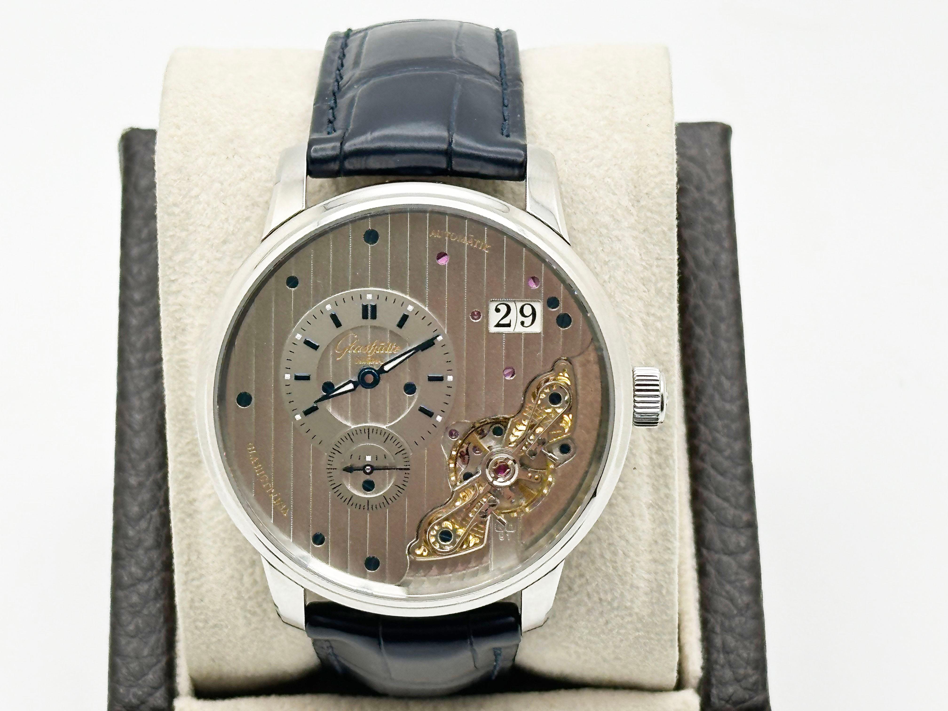 Style Number: 1-91-02-02-02-61

 

Model: Glashutte Original PanoMaticInverse 



Year: 2022

 

Case Material: Stainless Steel 

 

Band: Blue Leather 

  

Bezel: Stainless Steel 

  

Dial: Silver Dial 

 

Face: Sapphire Crystal 

 

Case Size: