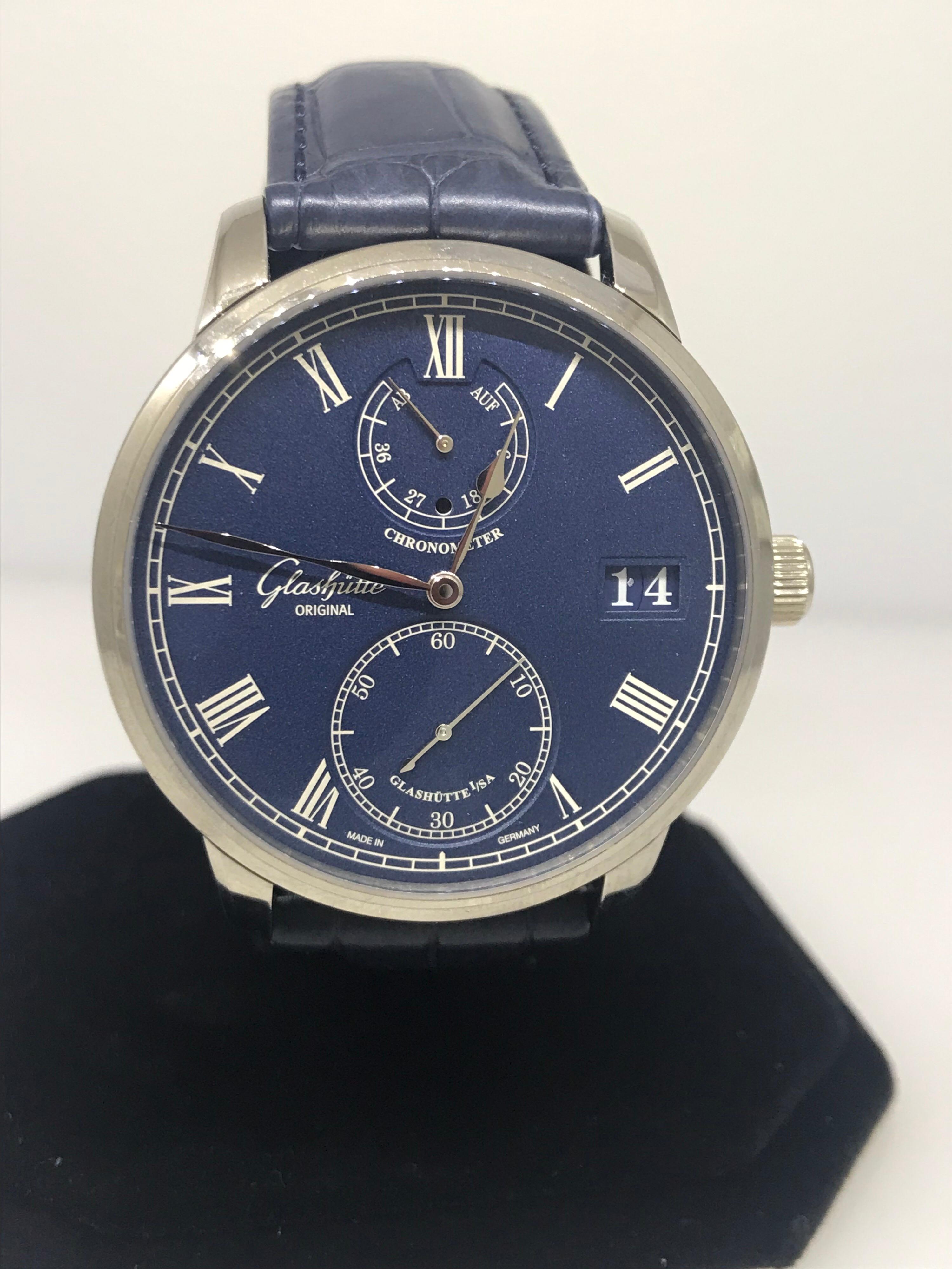 Glashutte Original Senator Chronometer Men's Watch

Model Number: 1-58-01-05-34-30

100% Authentic

Brand New

Comes with original Glashutte Original box and papers

18 Karat White Gold Case

Blue Dial

Case Size: 42mm

Functions: Hours, Minutes,