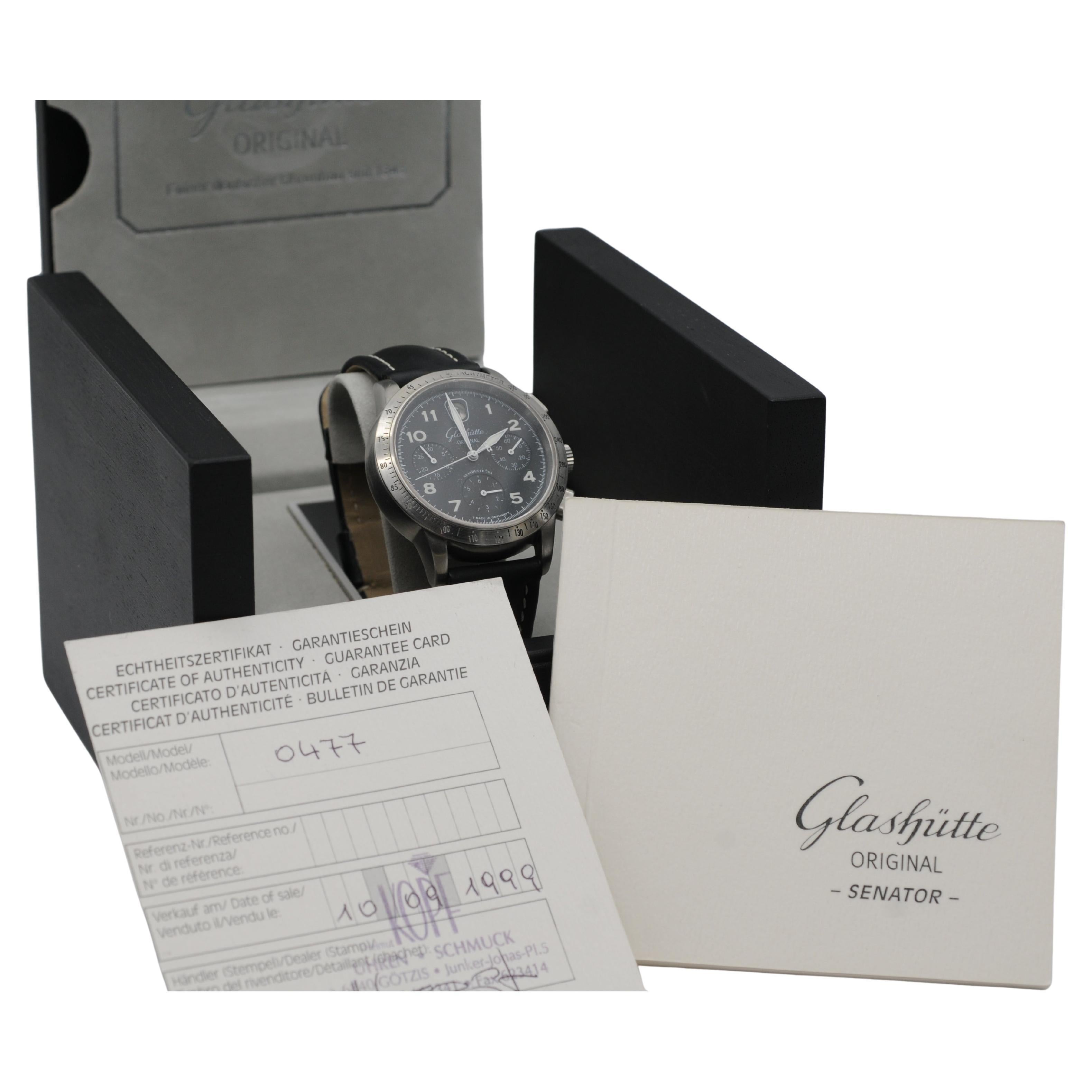 The rare Glashütte Original Senator Navigator Chronograph is a distinguished timepiece featuring a 39mm stainless steel case and an automatic GUB 39-32 movement. Its design includes a screw-down sapphire case back, offering a view of the intricate