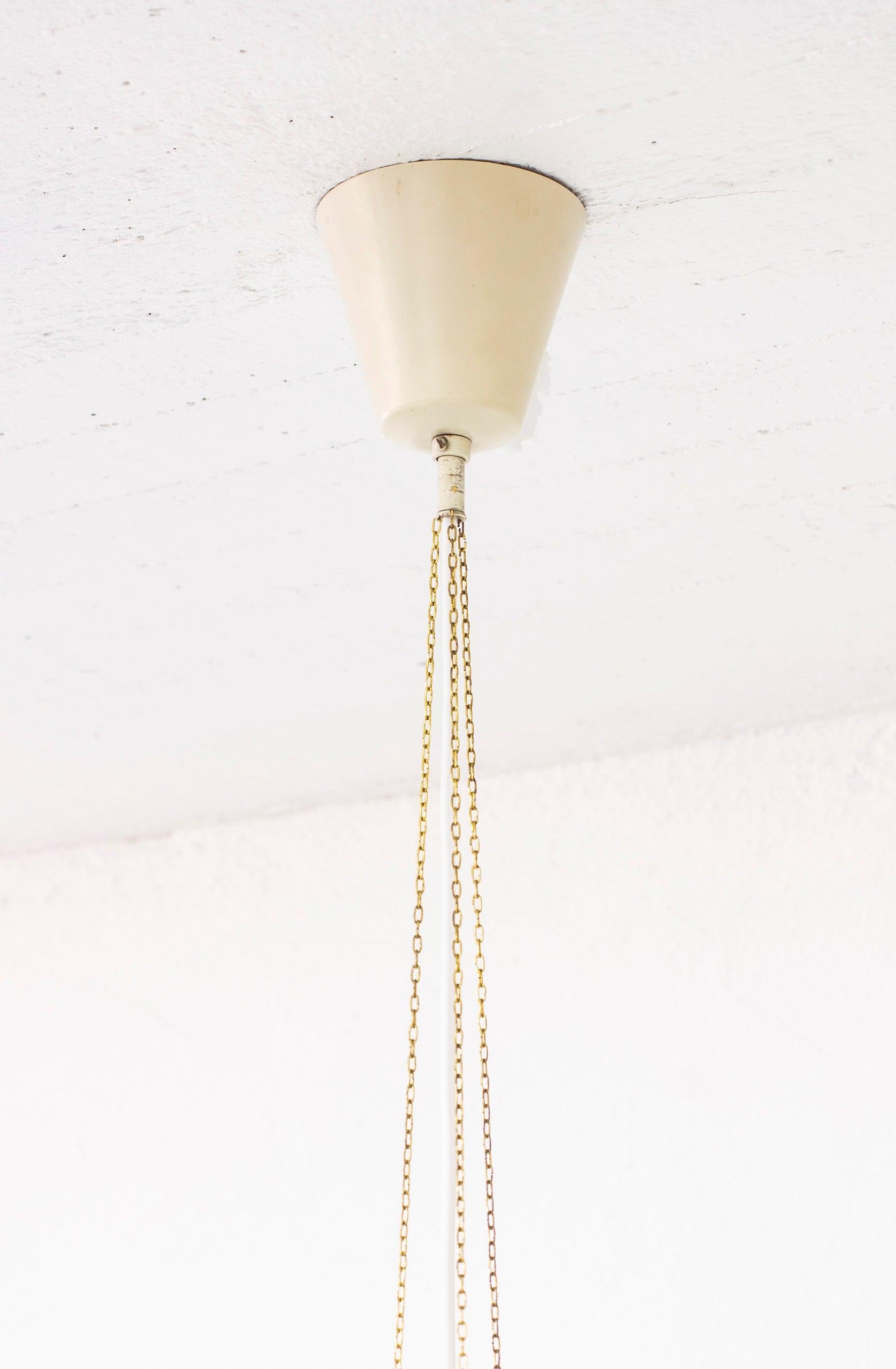 Scandinavian Modern Glass and brass ceiling pendant by Alf Svensson for Bergboms, Sweden, 1950s For Sale