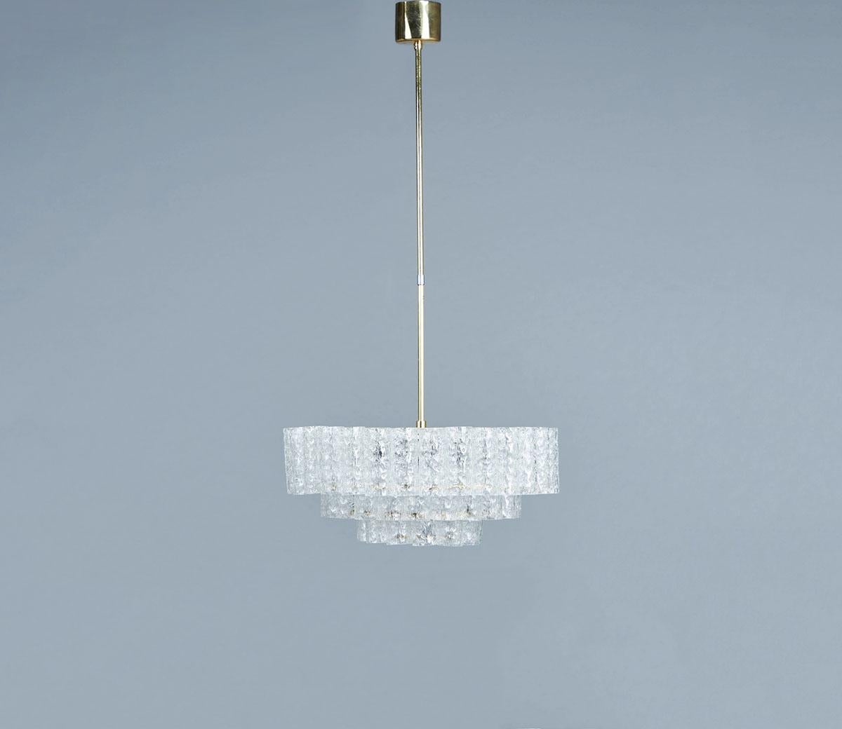 Mid-century modern chandelier produced by Doria Leuchten Germany in the 1960s.

The lamp has a brass frame with 3 rings with hooks.

The loose Murano glass tubes hang on the hooks.

The lamp has 6 E14 sockets sideways and 1 E14 downwards for a nice