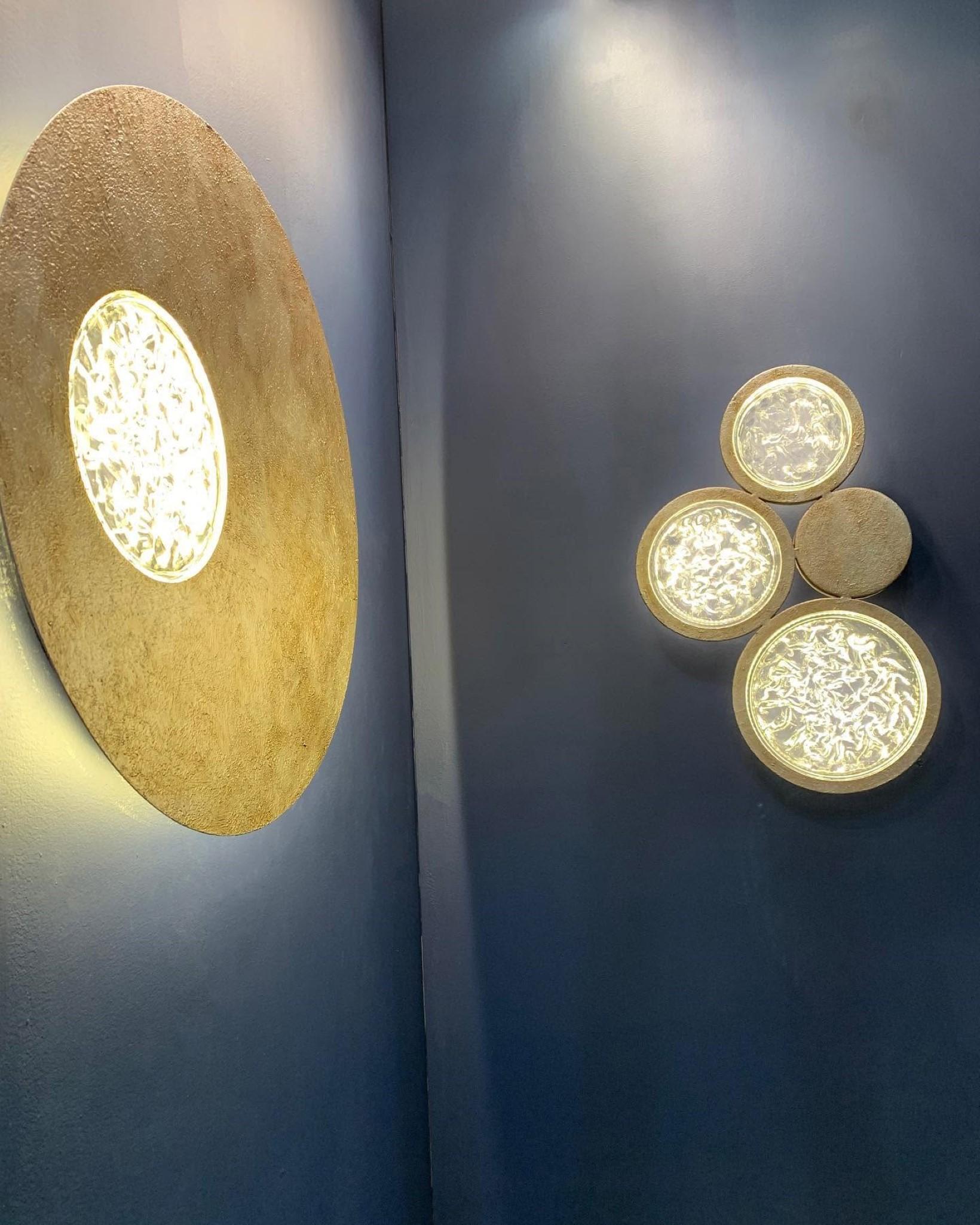 Glass and Brass Circle Wall Sconce – Elegant Ambient Lighting for Modern Homes In New Condition For Sale In Monroe, NY
