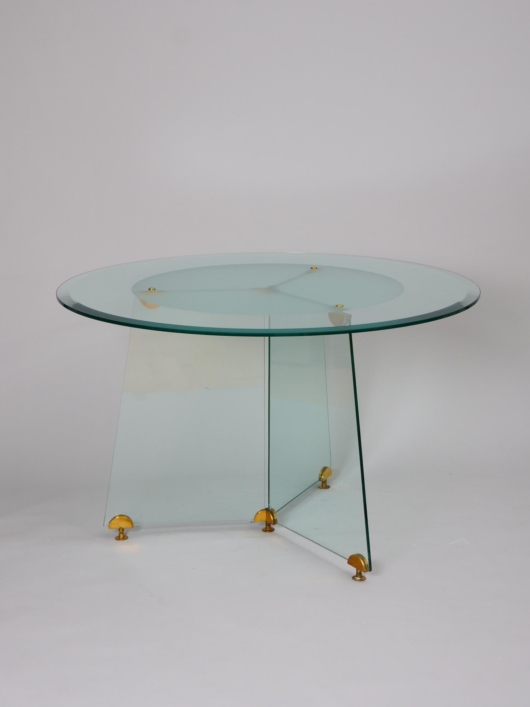 Lovely quality circular glass and brass table.  




