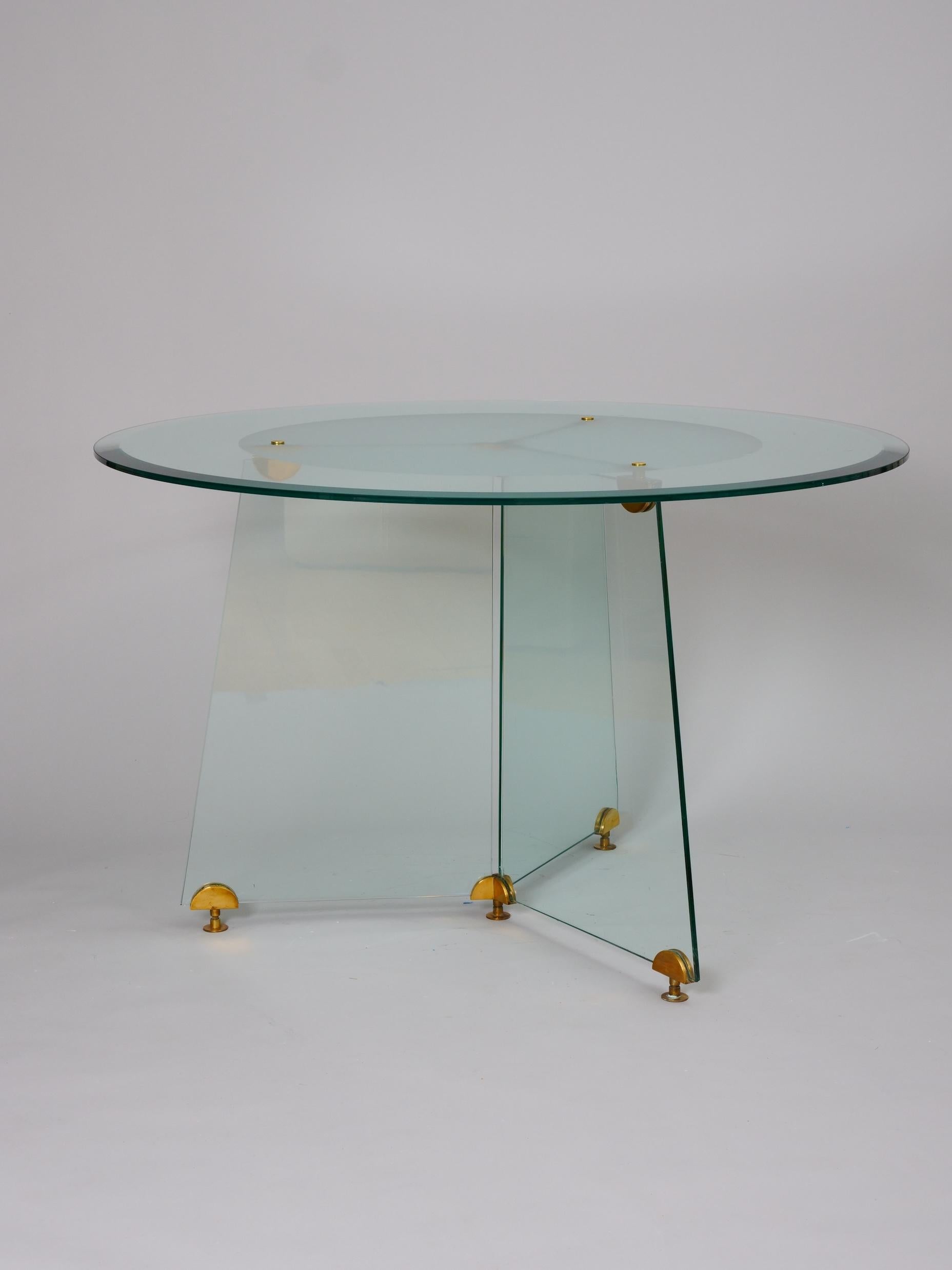 Mid-Century Modern Glass and brass circular table For Sale