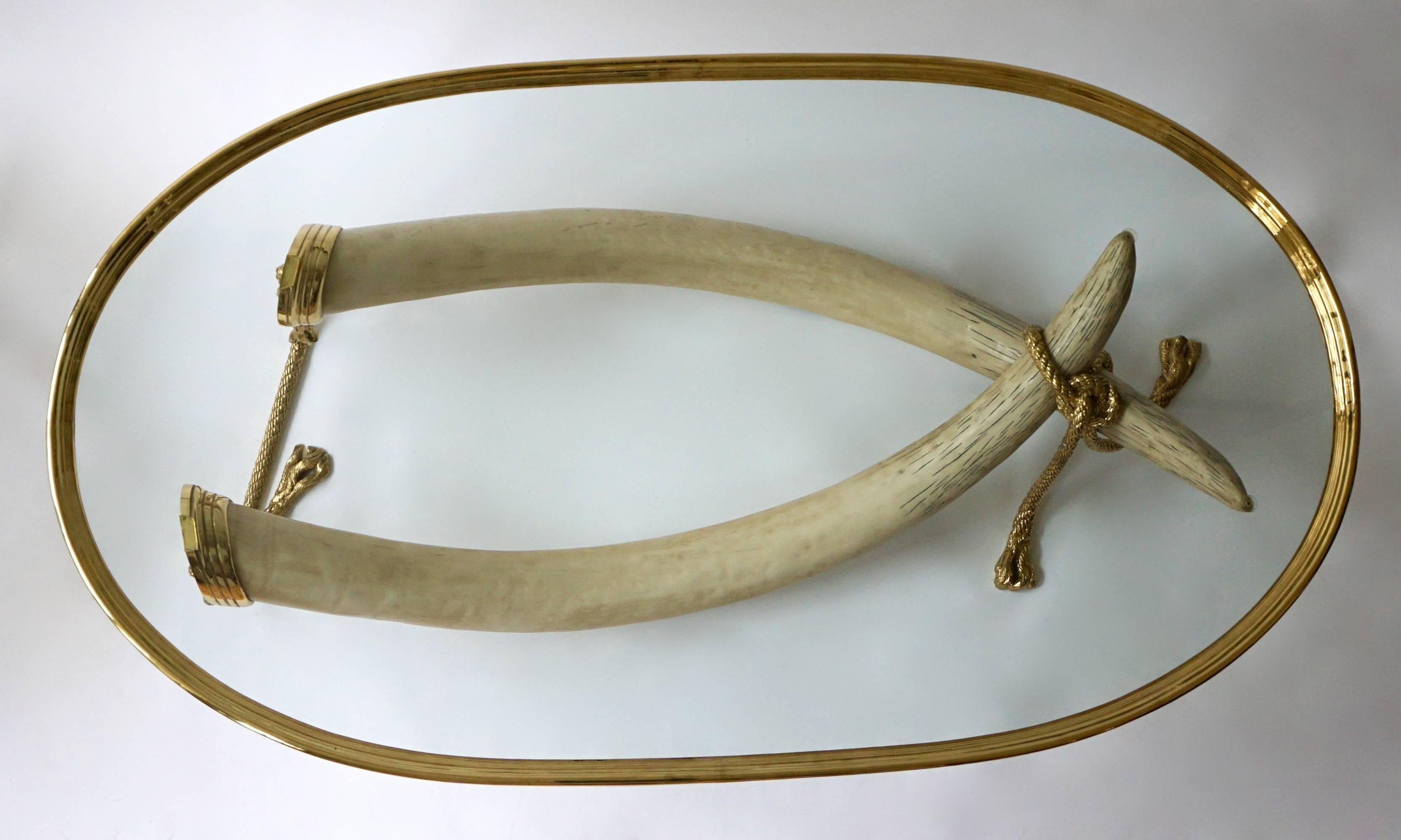 Hollywood Regency Glass and Brass Elephant Tusk Base Coffee Table by Valenti, 1970s
