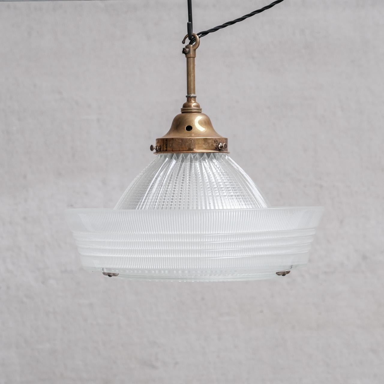 A large holophane style pendant light of unusual form - almost a 'sailors hat'.

France, c1930s.

Since re-wired and PAT tested.

No Chain or Rose was retained so will not be provided. They can be sourced easily online.

Internal ref: