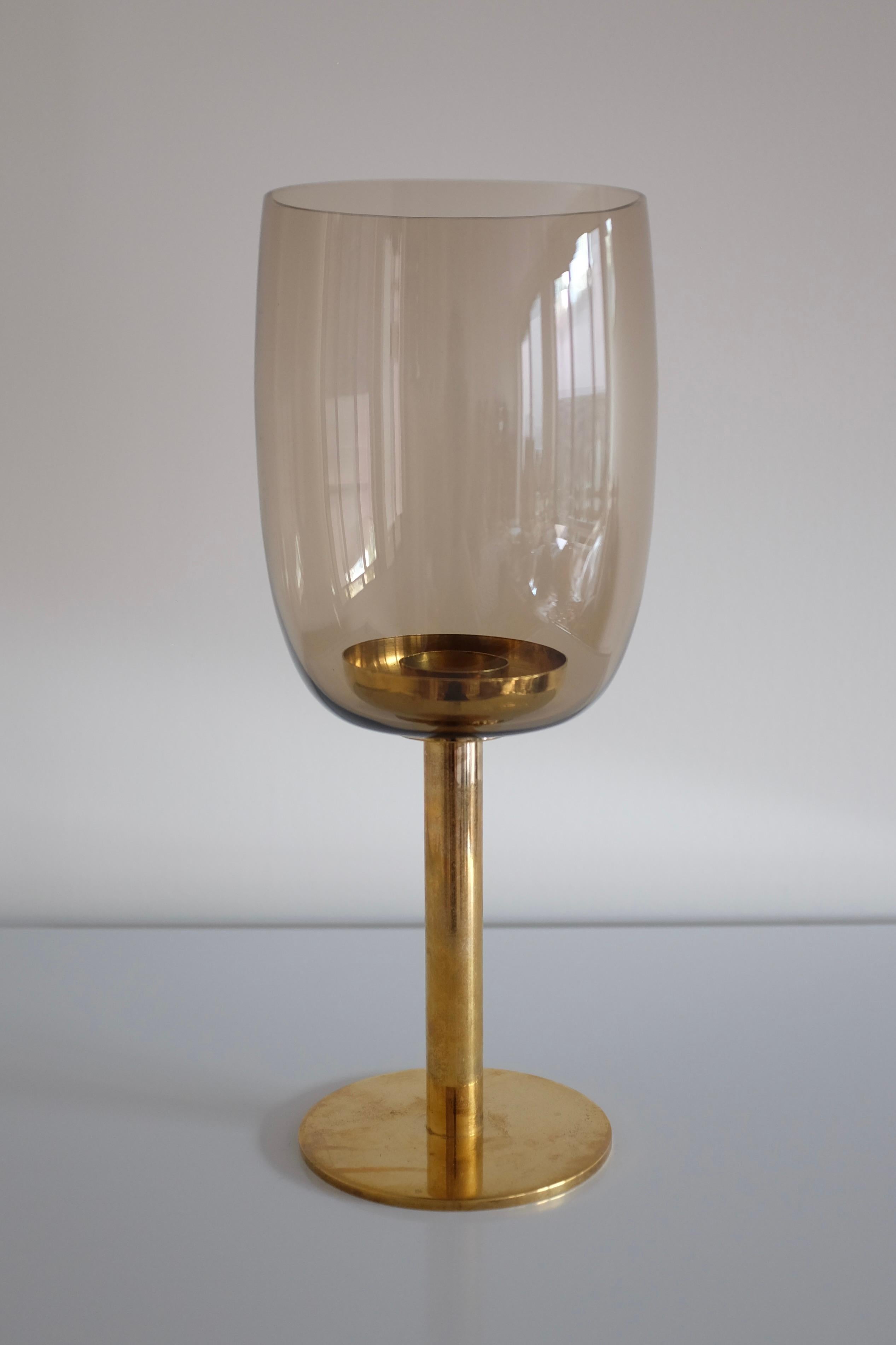 Large Glass and Brass Lantern Modell L27 by Hans Agne Jakobsson. Produced by the designer own company in Markaryd, Sweden, around the 1950's and in a very good vintage condition. There are some small chips at the bottom of the glass that are not