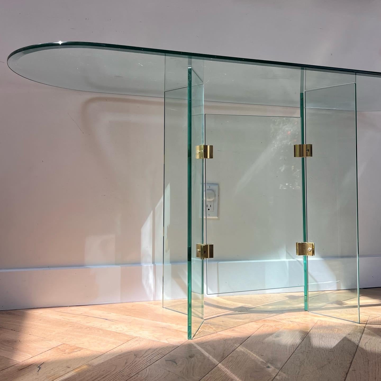 Brass Glass and brass oval console table by Leon Rosen for Pace, 1970s