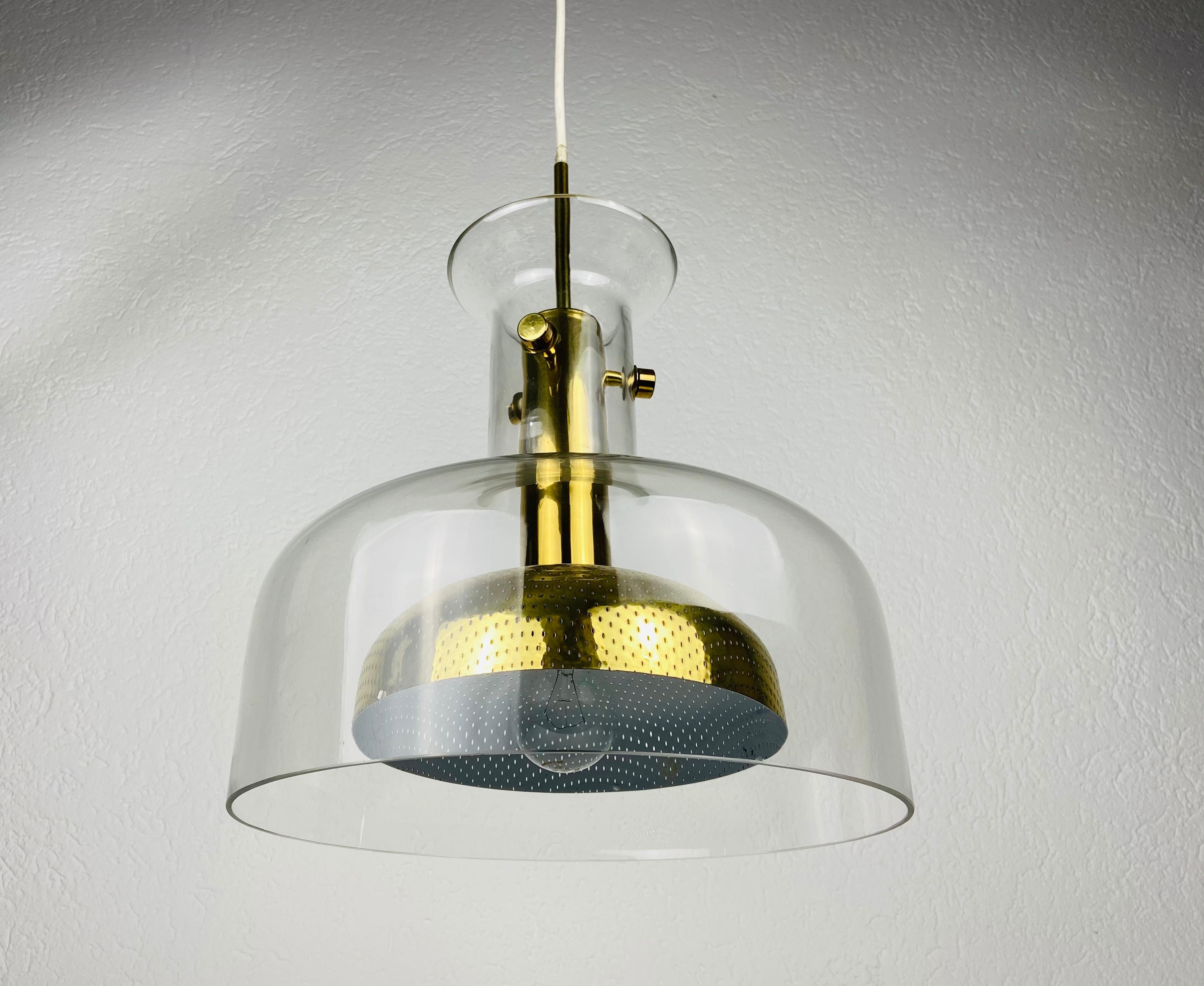 Beautiful pendant designed by Anders Pehrson and made in Sweden in the 1960s. It is fascinating with its exclusive design. The height of the lighting is adjustable.

The light requires one E26/E27 light bulb. Works with 110/120/220 V. Very good