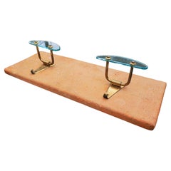 Glass and brass wall coat rack