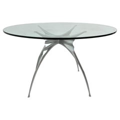 Glass and cast aluminum dining table, circa 1980
