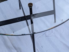 Glass and iron end table