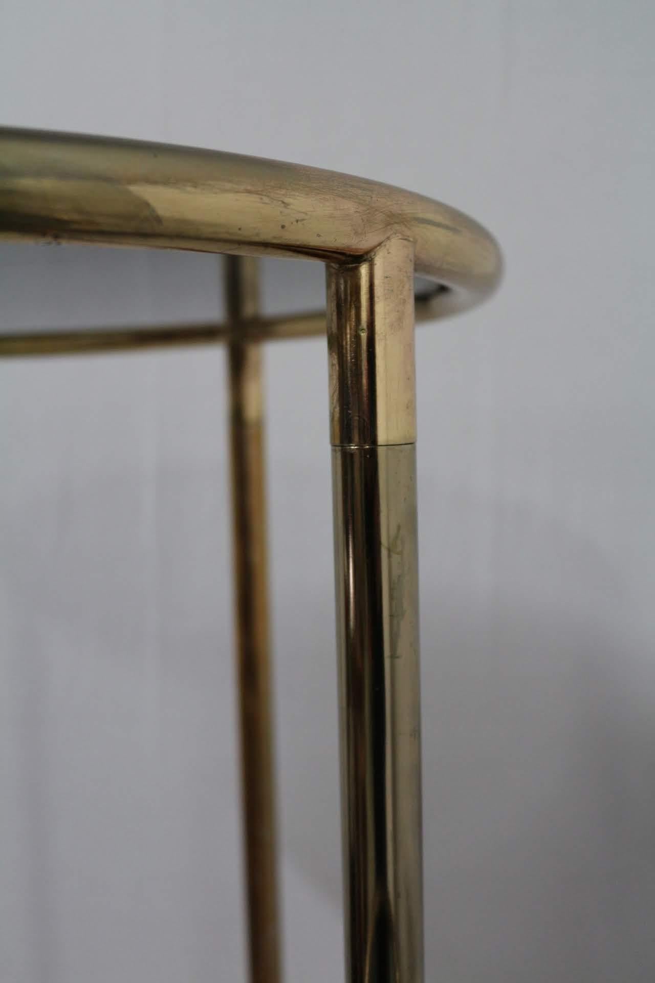brass and glass plant stand