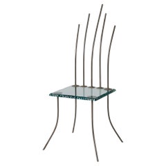 Glass and metal chair