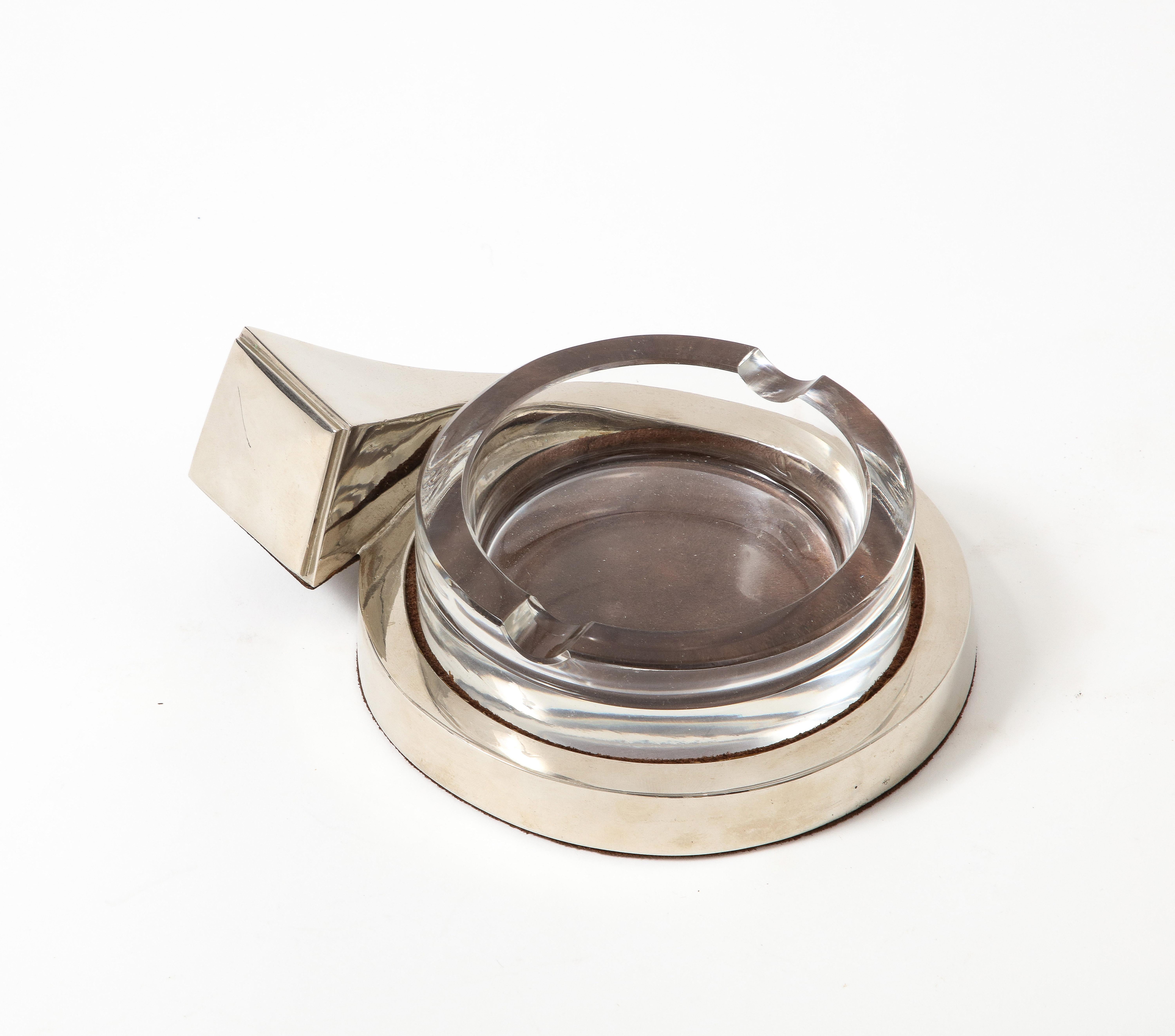 Vintage Gucci ashtray/vide poche featuring bold and modern sterling silver detailing around the glass tray.