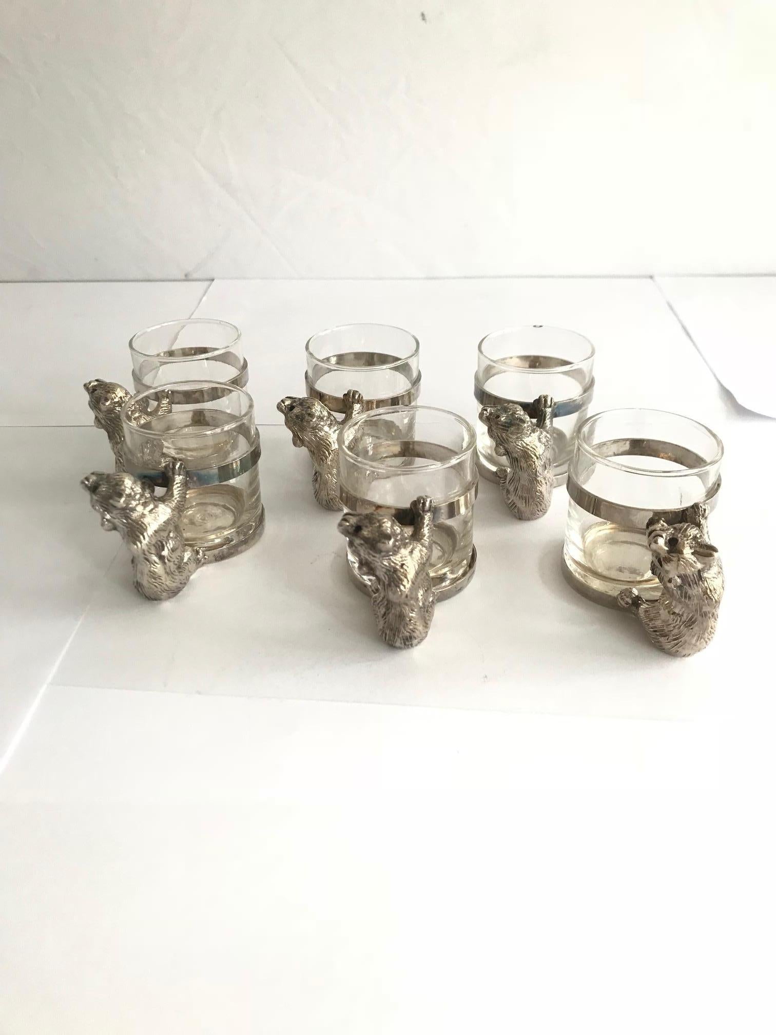 Gorgeous Russian vodka and caviar set in glass and silver plate
Comes with six glass shot glasses with silver plate bears
Main vessel has the inner insert dish for caviar
Shot glass H 5 cm or 2in. D 4 cm. or 1.5 in.
Great collectors piece.