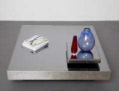 Glass and stainless steel coffee table by Giovanni Ausenda, NY Form 1970