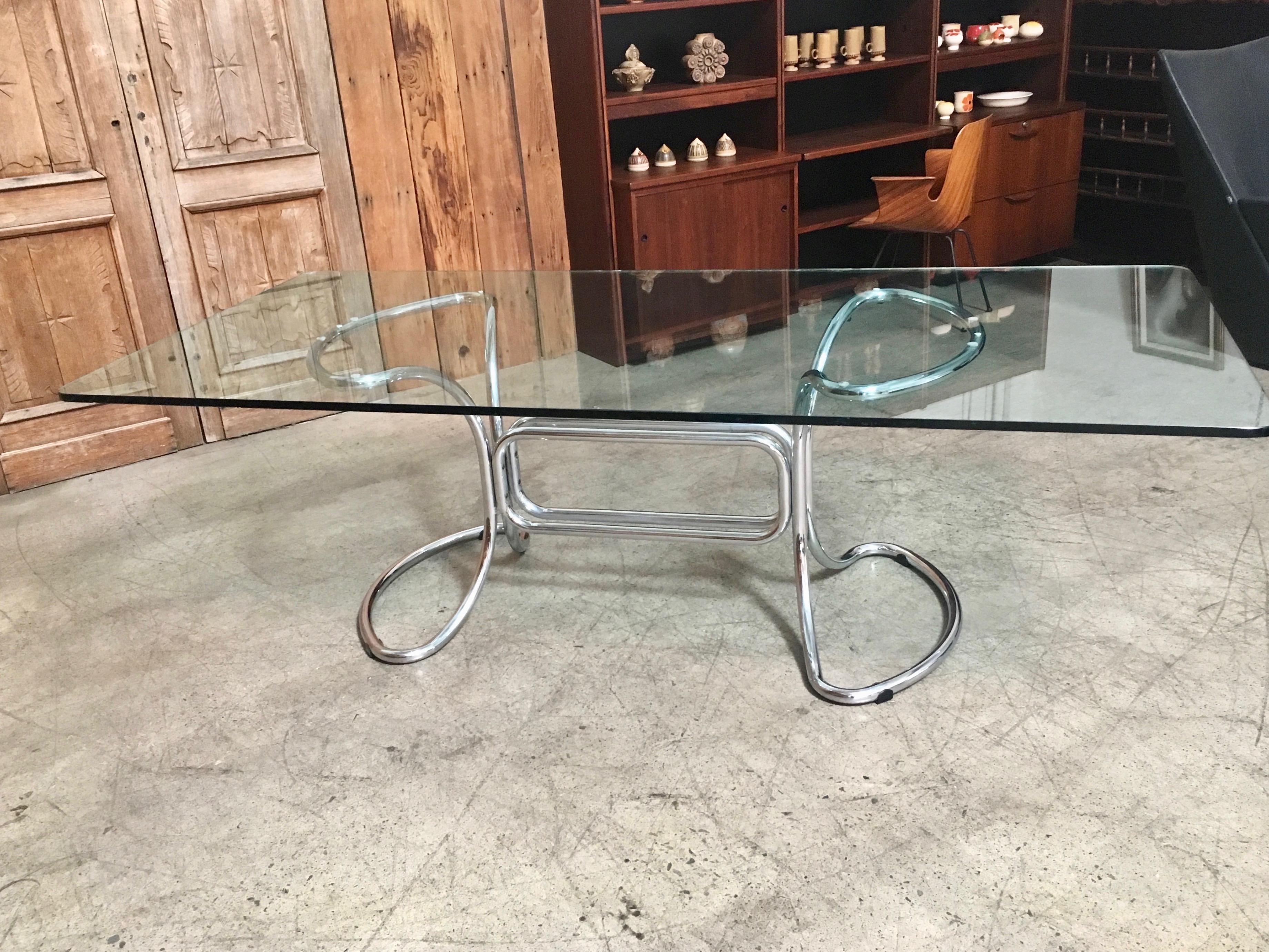 Italian glass & steel tube dining table by Giotto Stoppino, Italy 1970s. Table base measures 59.5 long by 28