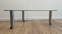 Glass Biomorphic Coffee table on casters