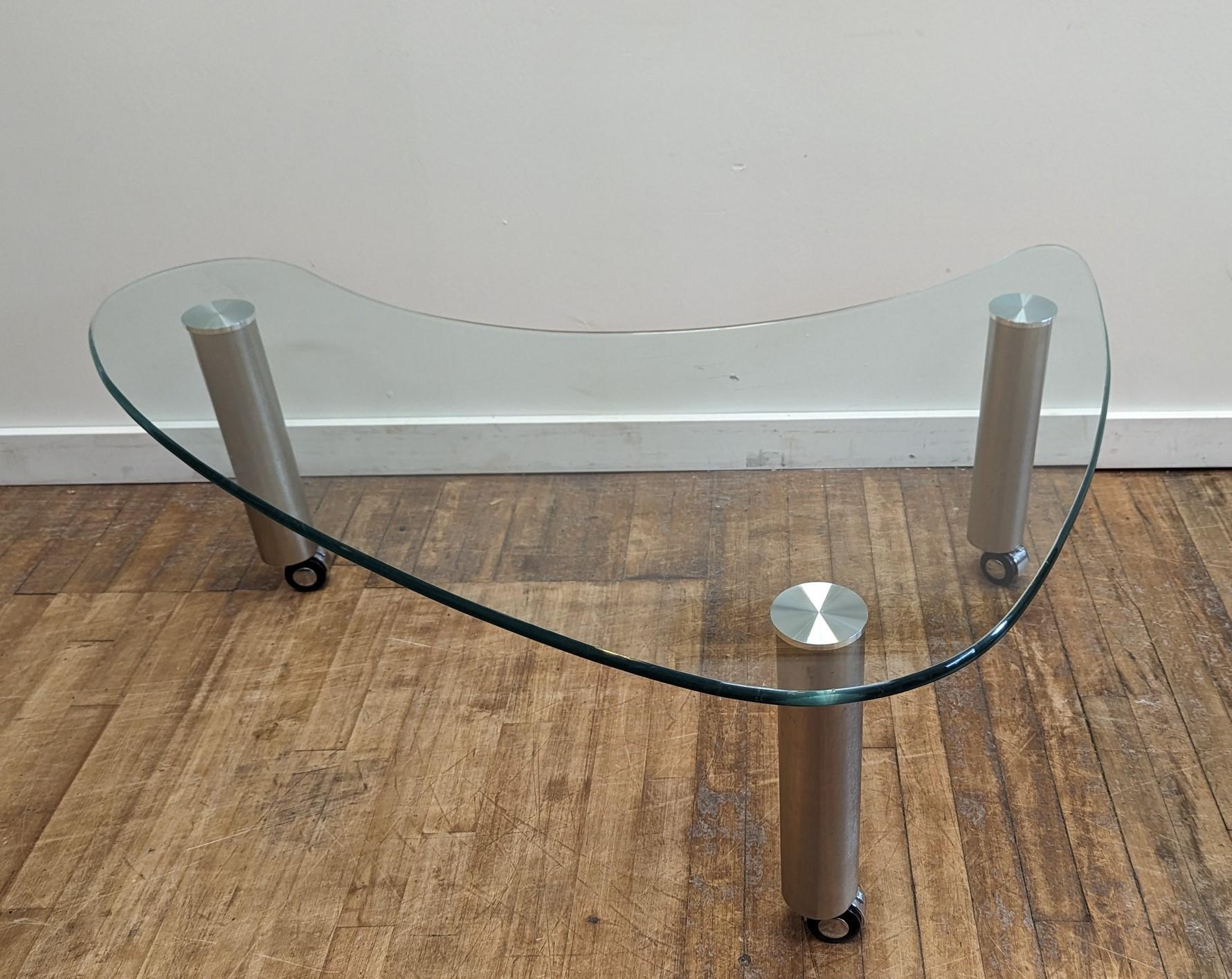 Late 20th Century Glass Biomorphic Coffee table on casters  For Sale