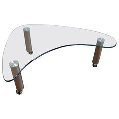 Glass Biomorphic Coffee table on casters