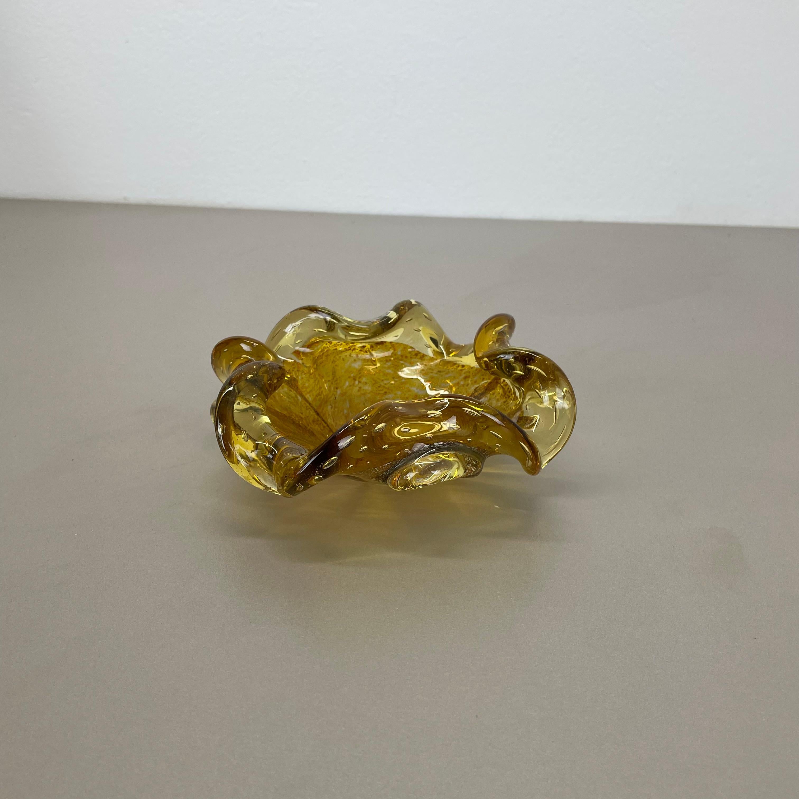 Article:

Murano glass bowl, ashtray element by Barovier and Toso


Origin:

Murano, Italy


Decade:

1970s



This original vintage glass bowl element, ash tray was produced in the 1970s in Murano, Italy. It is made in murano technique and has a