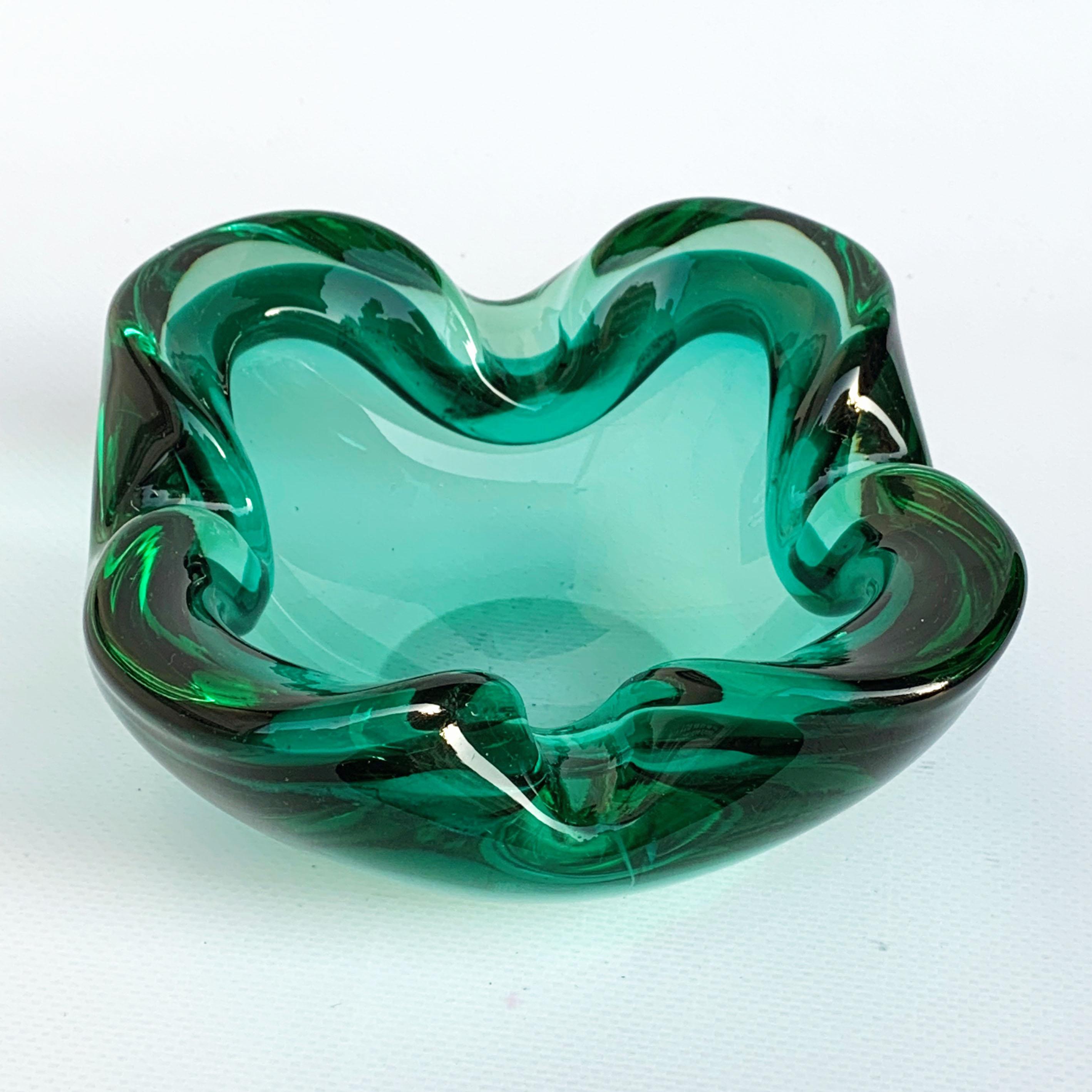 Glass bowl or ashtray. Green glass Sommerso Murano, Italy, 1960s.
No chipping.