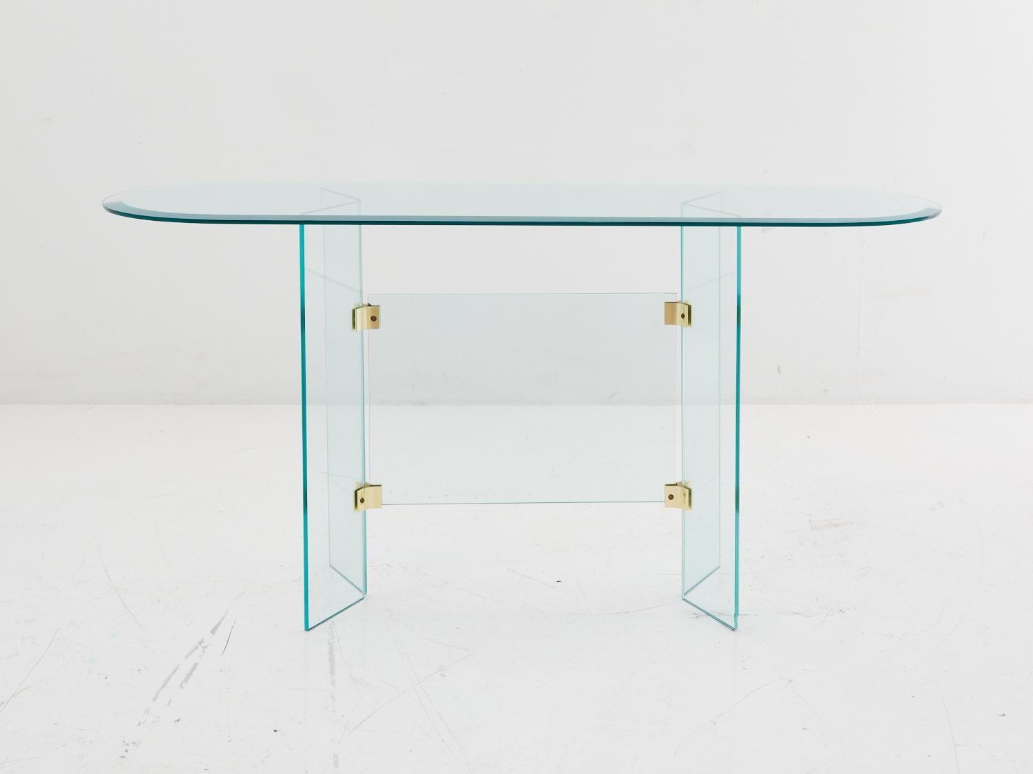 The Glass & Brass Console Table by Pace is here to make a statement: 