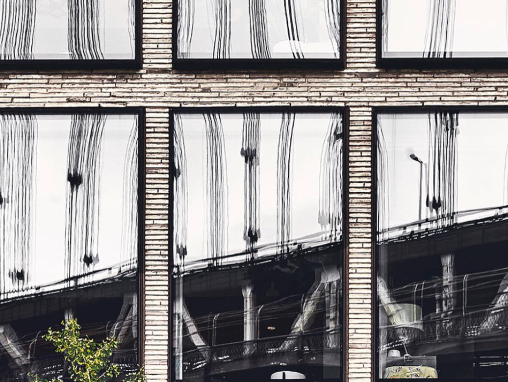 Part of the Reflections collection released by Spanish photographer Cuco de Frutos in 2019. This original photograph depicts the strong history of Brooklyn reflected on its modern urban development. Uniform and precisely symmetrical, alone this