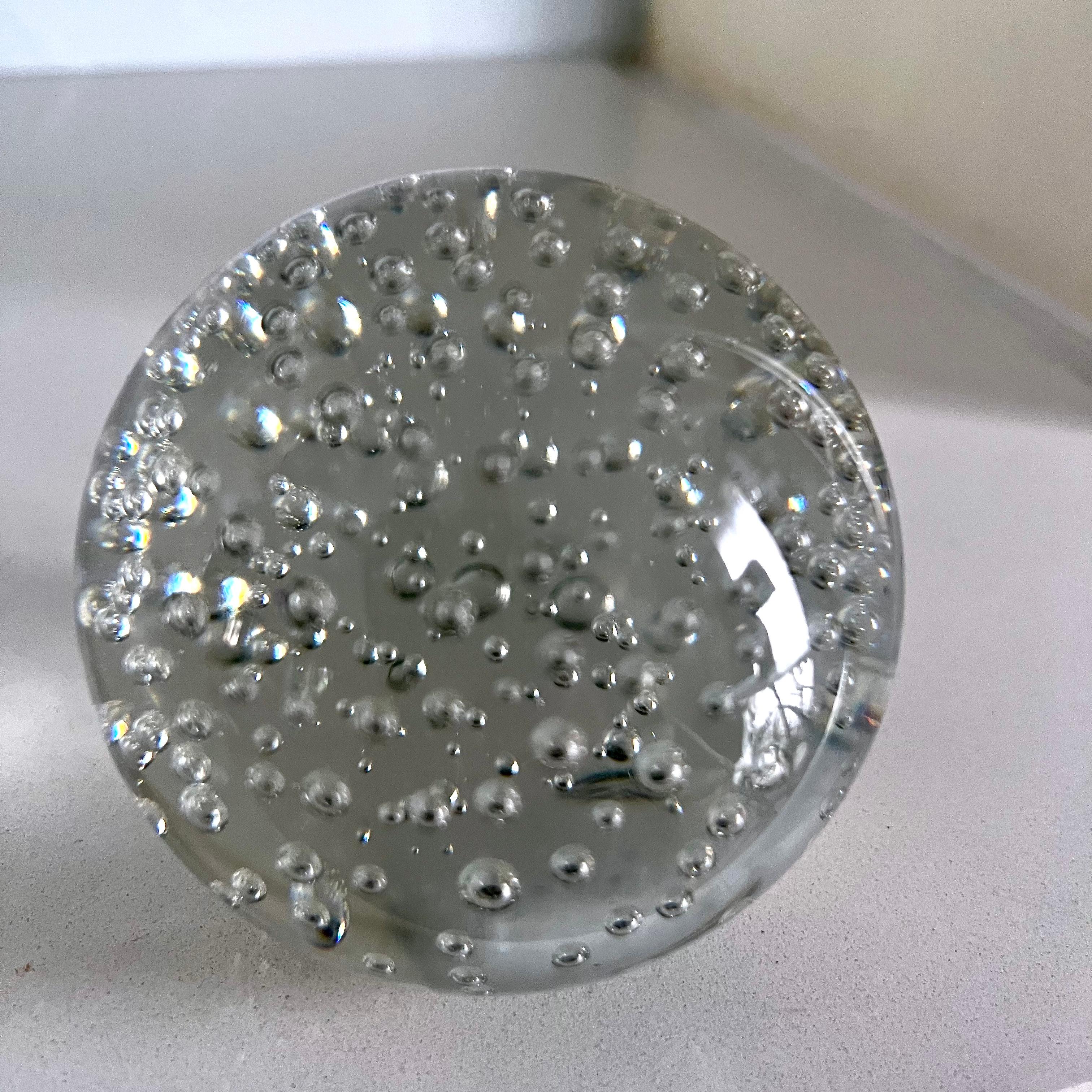 Clear vintage Murano glass bubble paperweight or decorative object. Small bubbles.