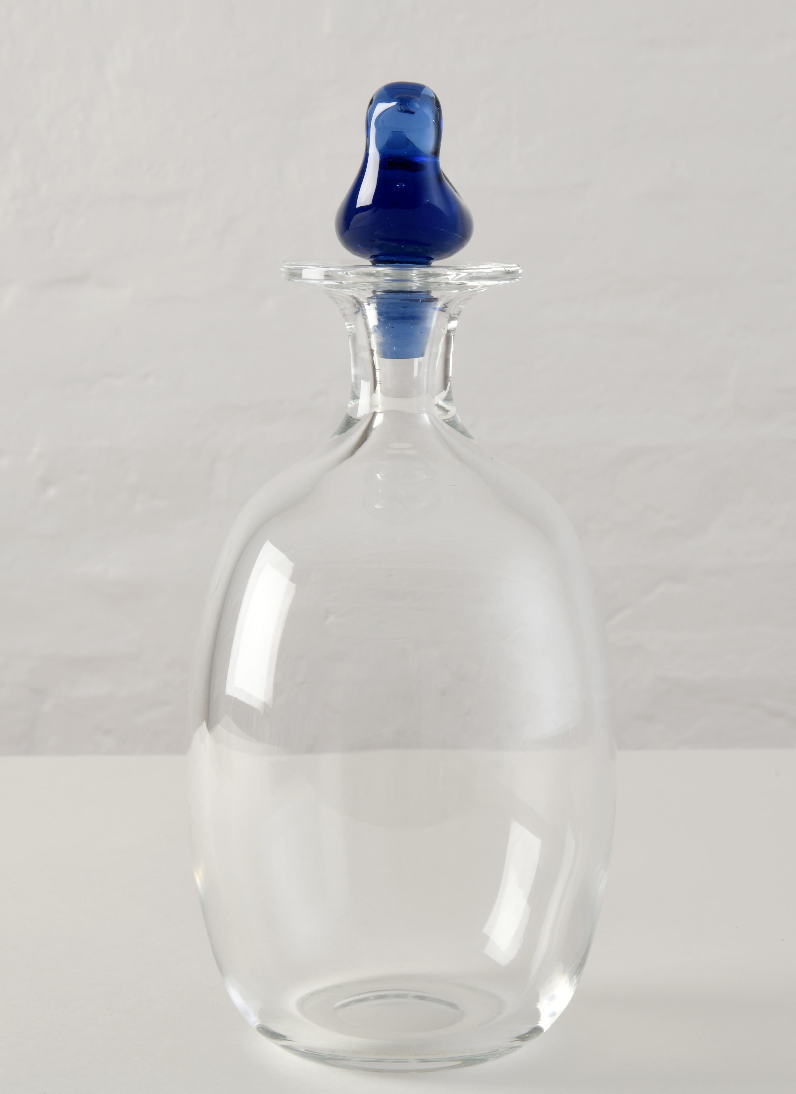 Danish Glass carafe with a blue bird designed by Michael Bang for Holmegaard in Denmark For Sale
