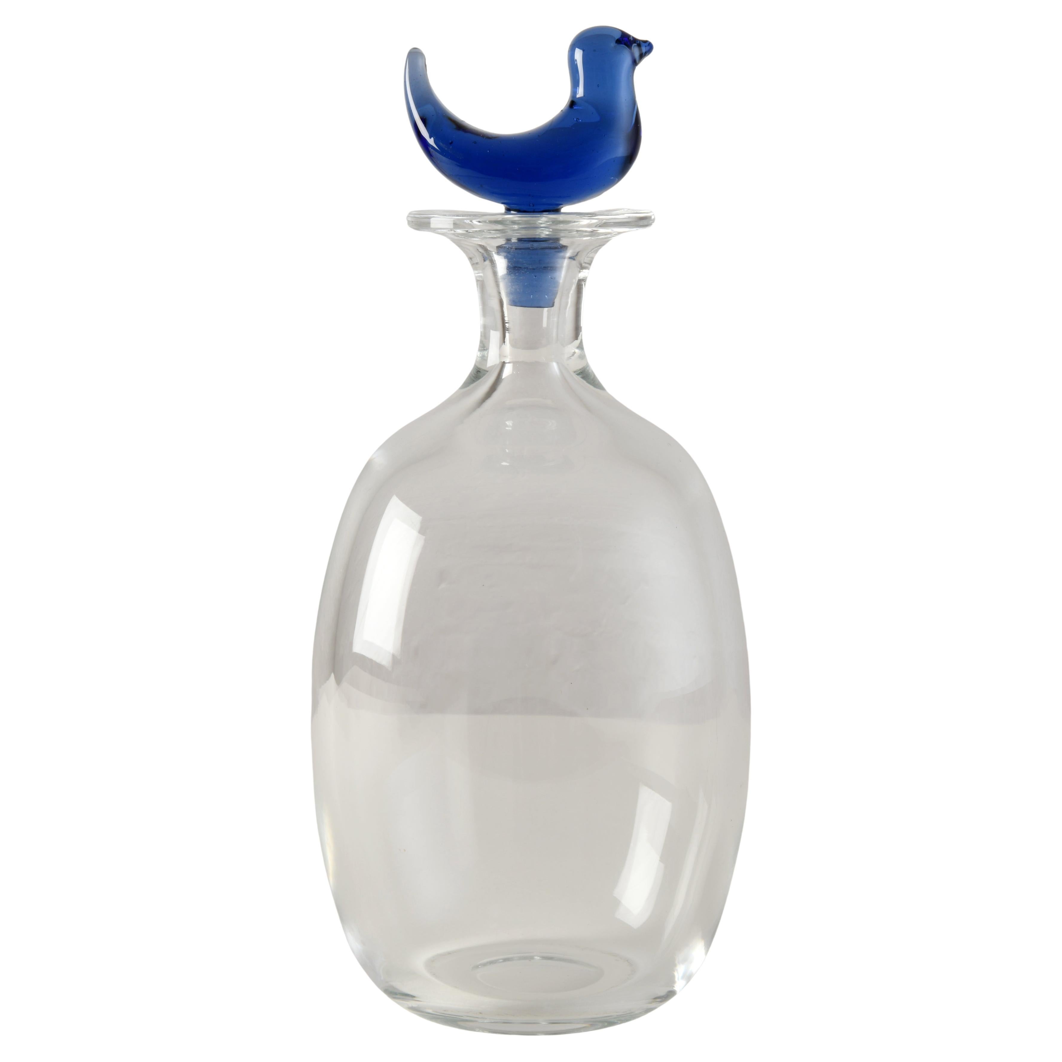 Glass carafe with a blue bird designed by Michael Bang for Holmegaard in Denmark For Sale