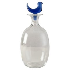 Antique Glass carafe with a blue bird designed by Michael Bang for Holmegaard in Denmark