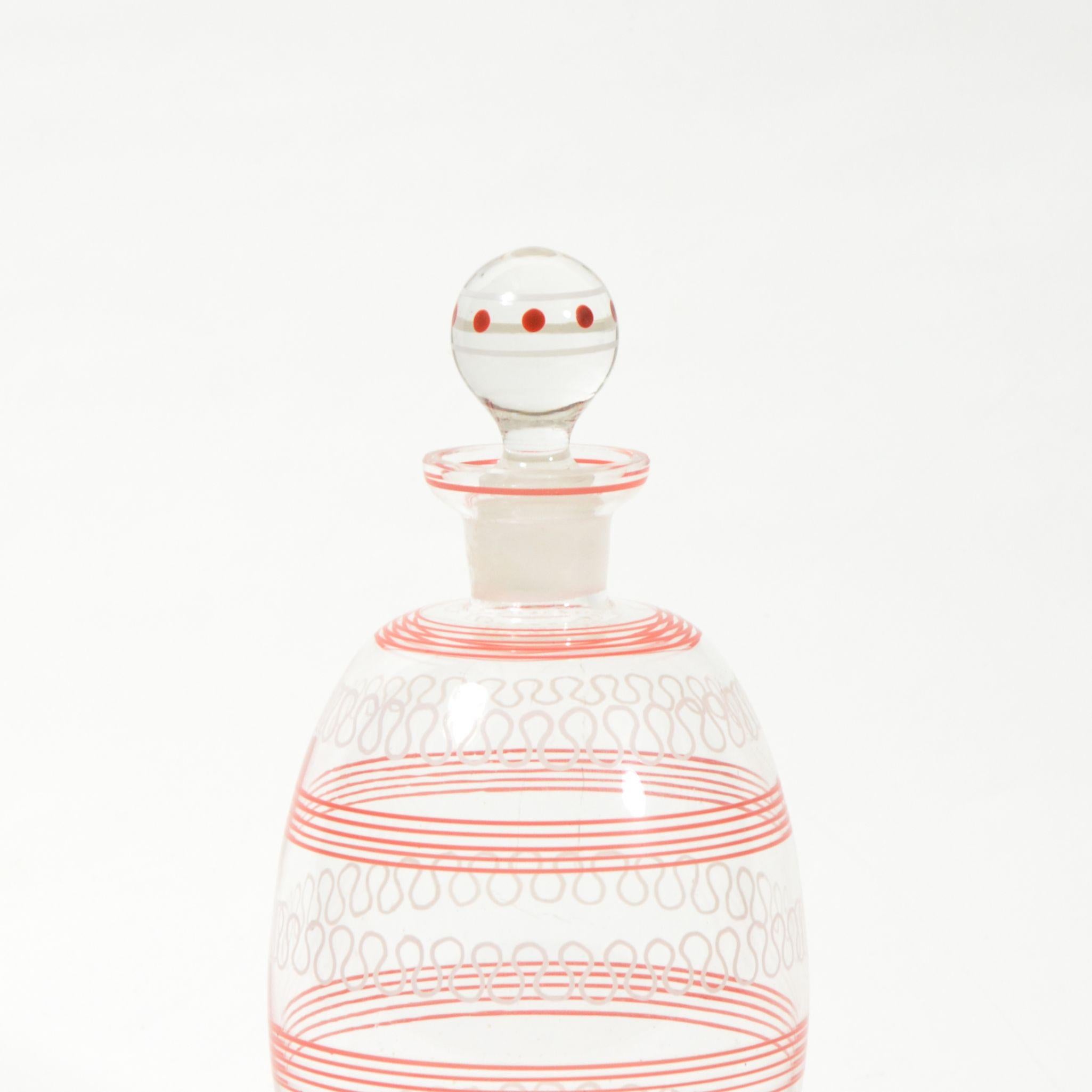 Glass carafe with stripes pattern. Cap sealed with a rubber stopper. Czechoslovakia, 1960s. Without any damages, in perfect original condition.