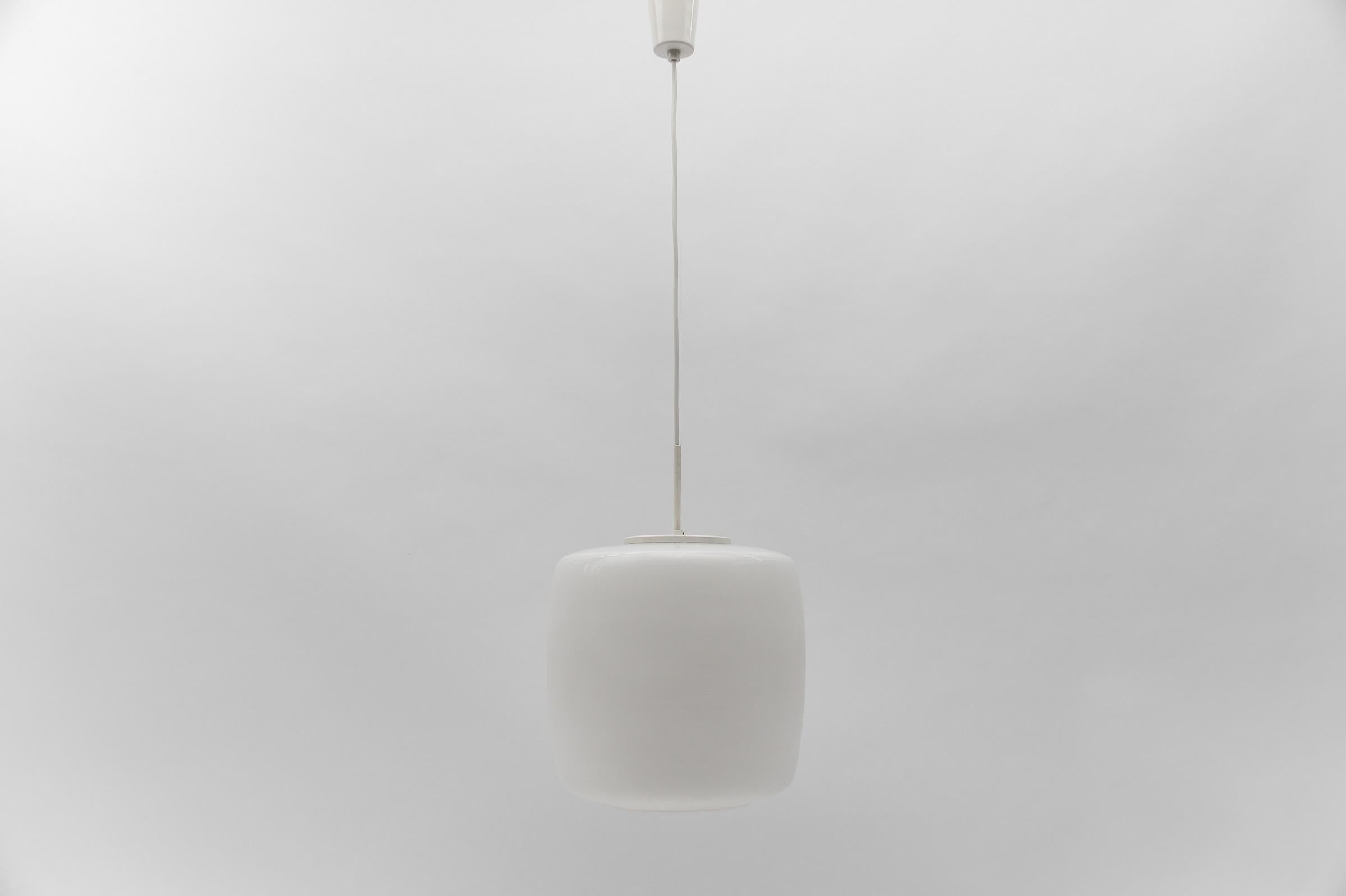 Design by Wilhelm Wagenfeld for Peill & Putzler, Du¨ren, Germany 1954.

1x E27 socket. 

Measures: Total height 110cm. Diameter 24cm. 

The Peill and Sohn Glassworks in Düren, destroyed in World War II, and the Putzler brothers' works in