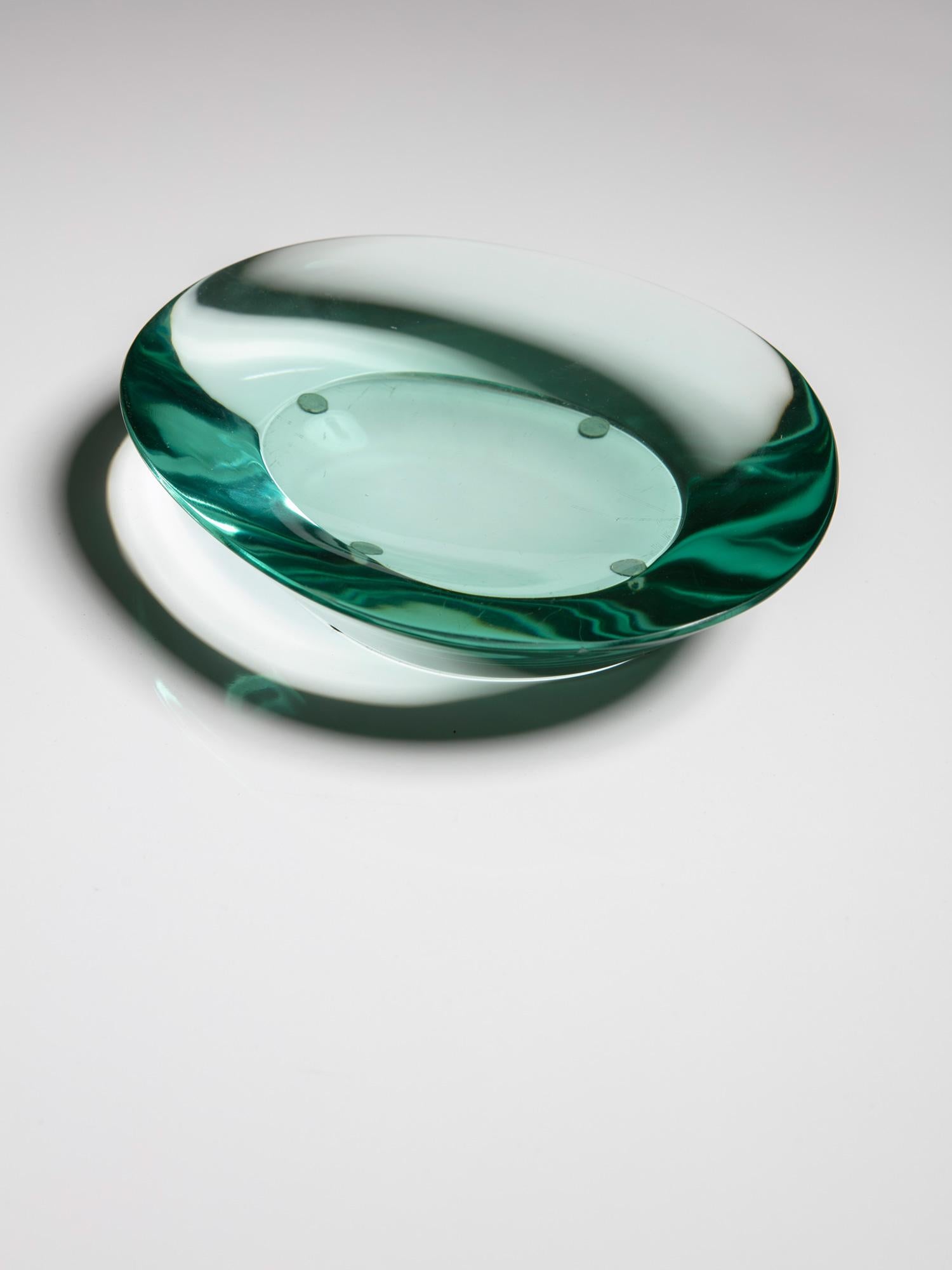 Eye-catchy thick glass centerpiece manufactured by Fontana Arte.