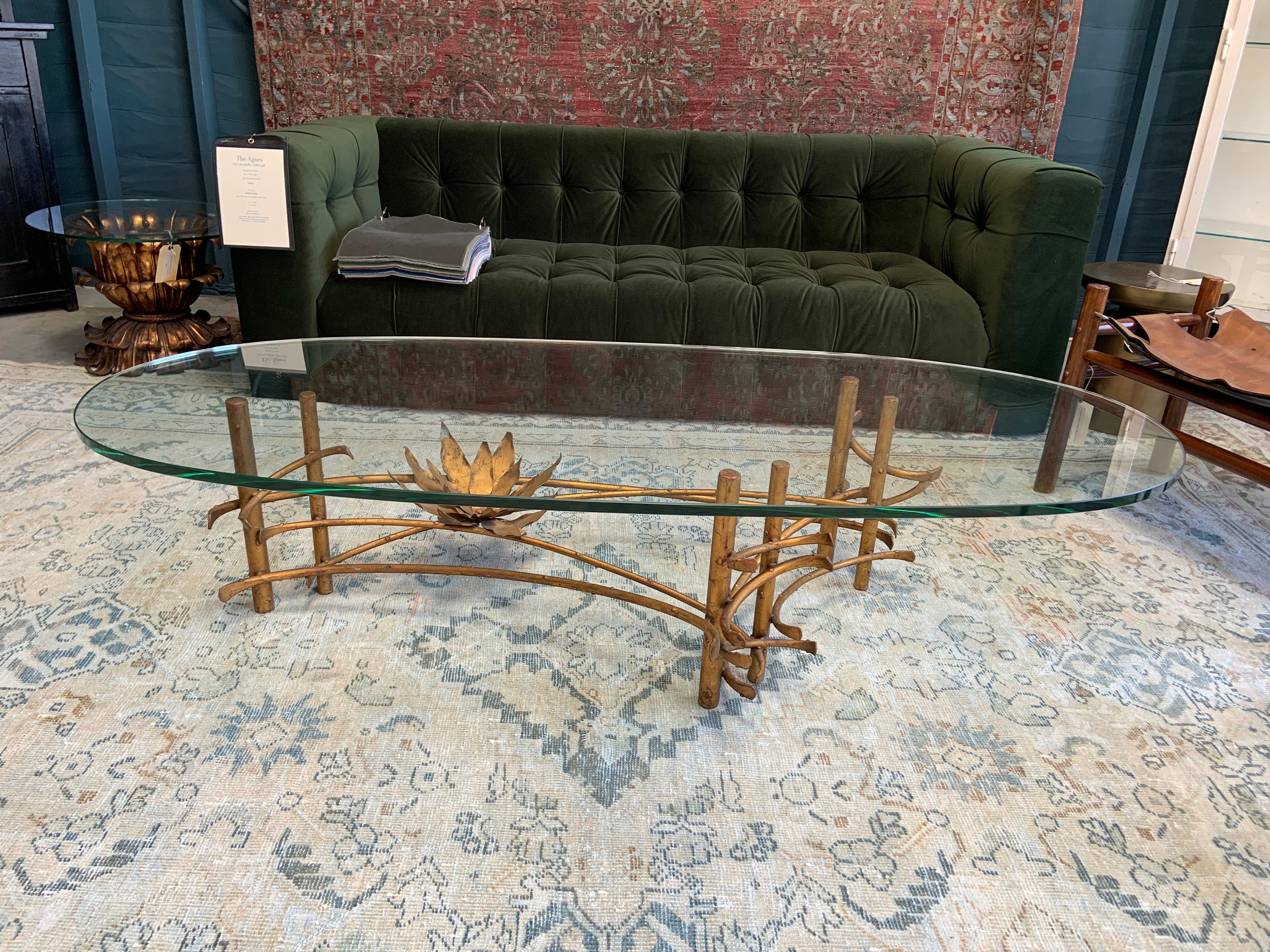 Glass Coffee Table with Antique Gilt Legs In Distressed Condition In Los Angeles, CA