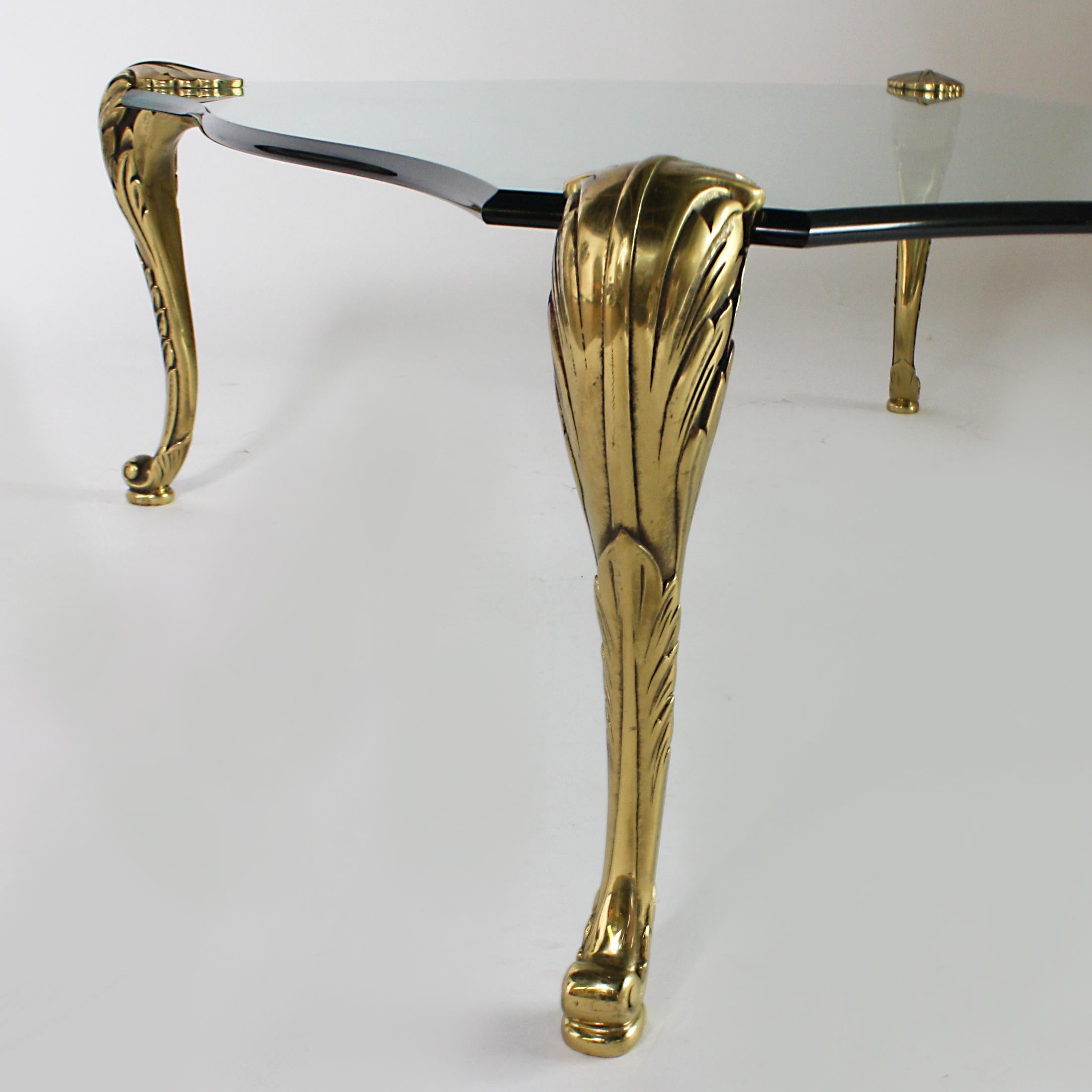 glass table with brass legs