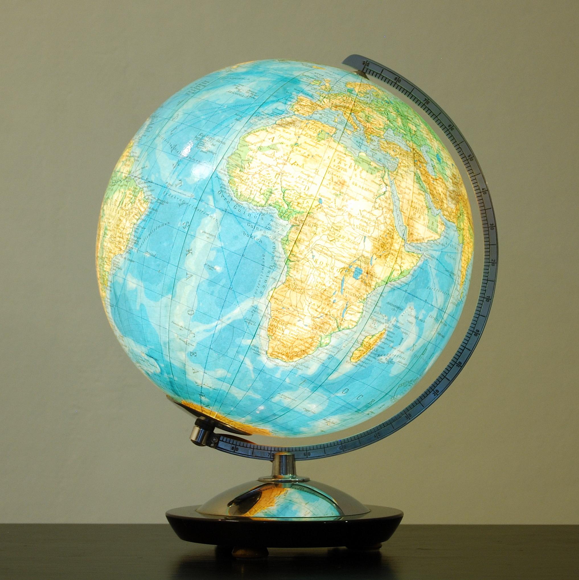 A smaller Columbus Duo glass globe by Columbus Verlag, Germany. Glass sphere with a stained wood and chrome steel frame. Manufactured in the early 1960s, Kenya are 