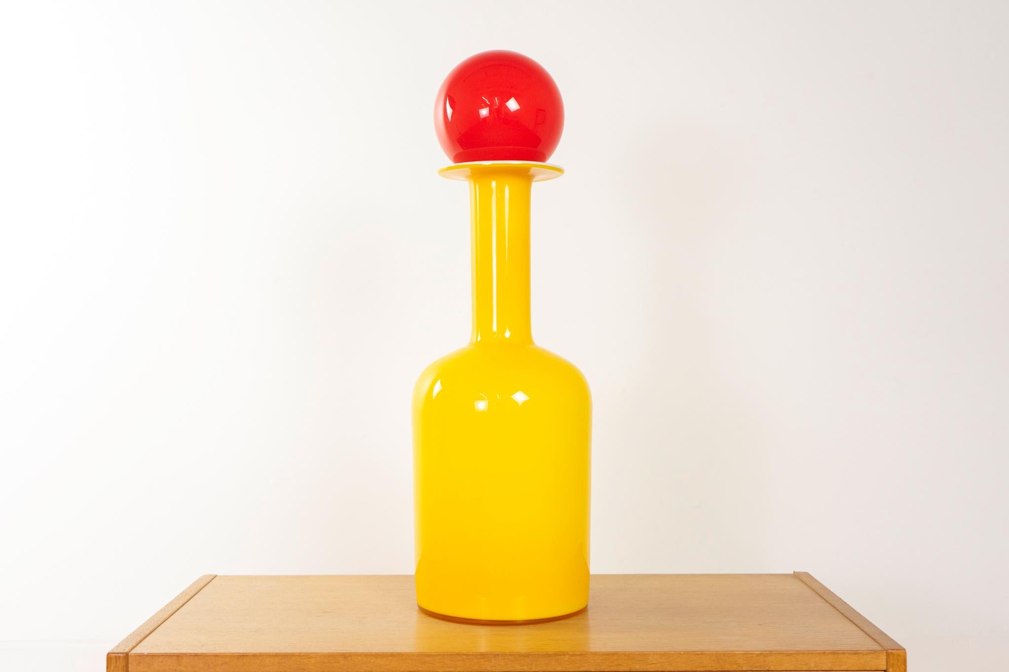Glass Danish Gulvase vase by Otto Brauer for Holmegaard, circa 1960s. Glorious yellow and opal white cased glass with bright red topper sphere. Add a POP of color to your abode! 