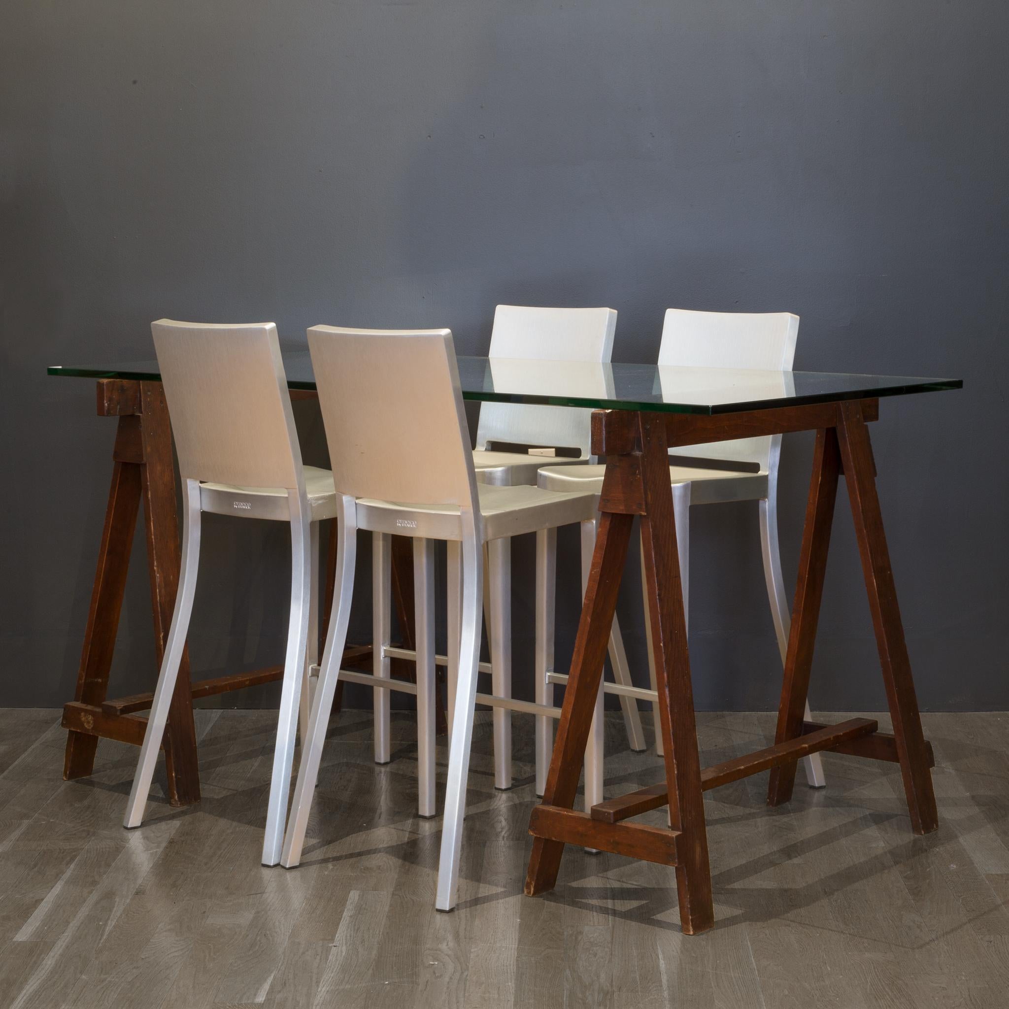 About

This is an original glass dining table with early 20th century Douglas Fir sawhorses. The glass sits on top and is not fixed to the base. The William Sonoma glass has superficial scratches throughout but no chips. The saw horses have retained