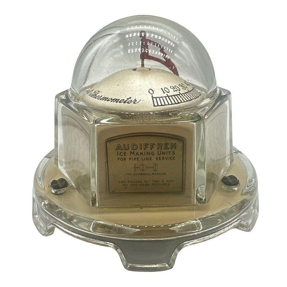 Rare NYC Glass Dome Desktop Thermometer Fahrenheit thermometer made by Mova Products Co., Inc Long Island NY., patented on December 18, 1923, with an advertisement for the Audiffren Ice Making Units.

It features a modern Art Deco design, with a